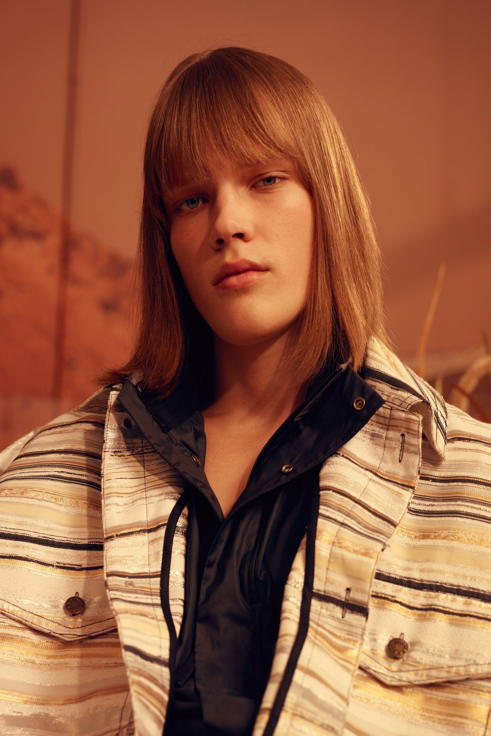 striped jacket and black shirt