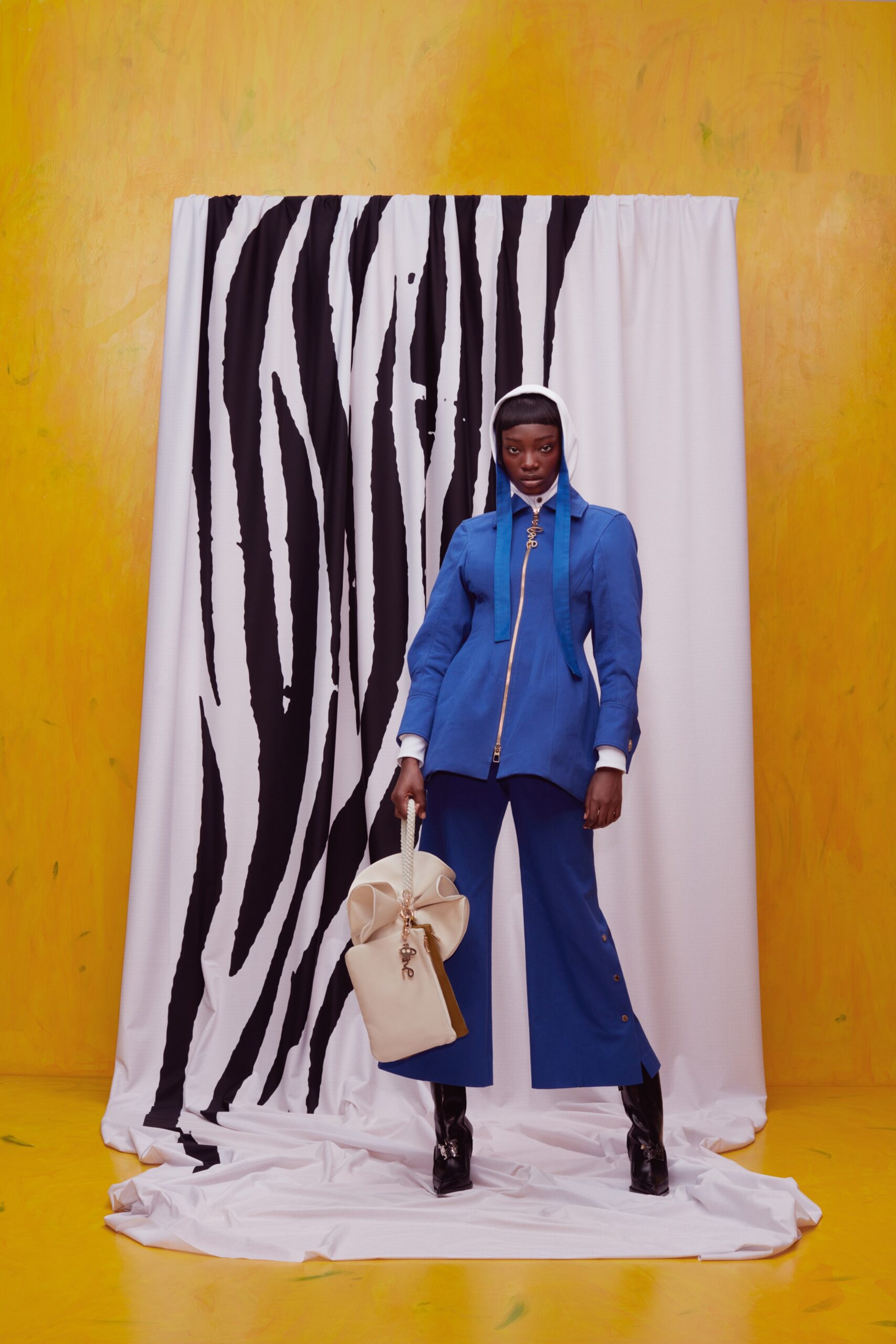 blue fitted jacket with tailored pants