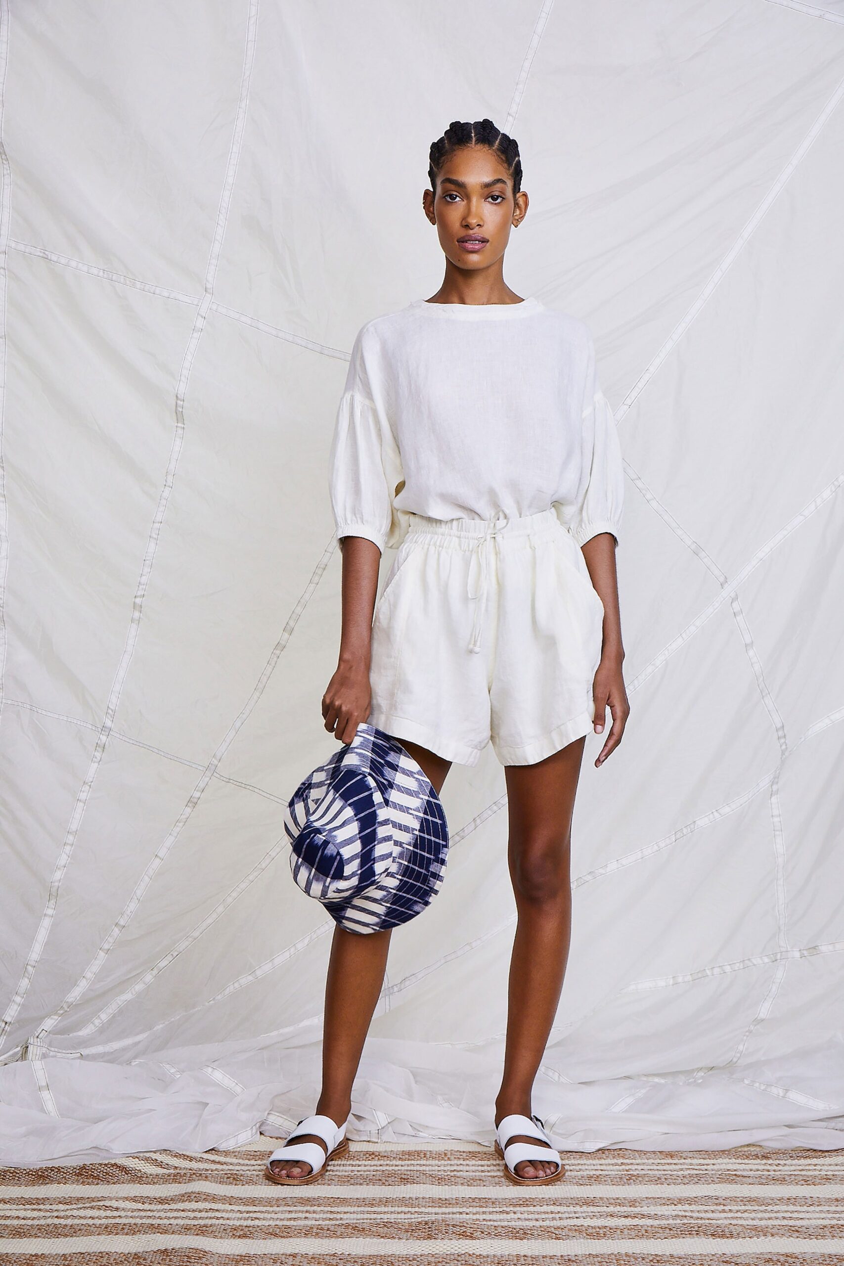 white linen top with beige shorts