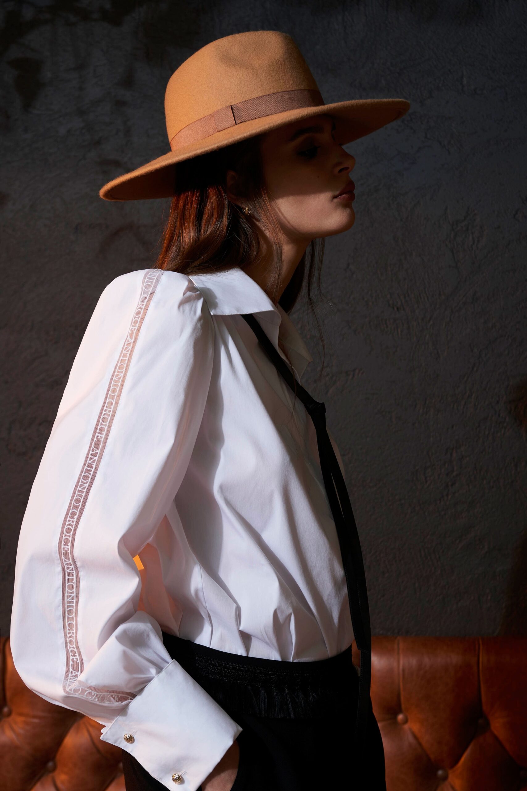white fitted shirt with black pants