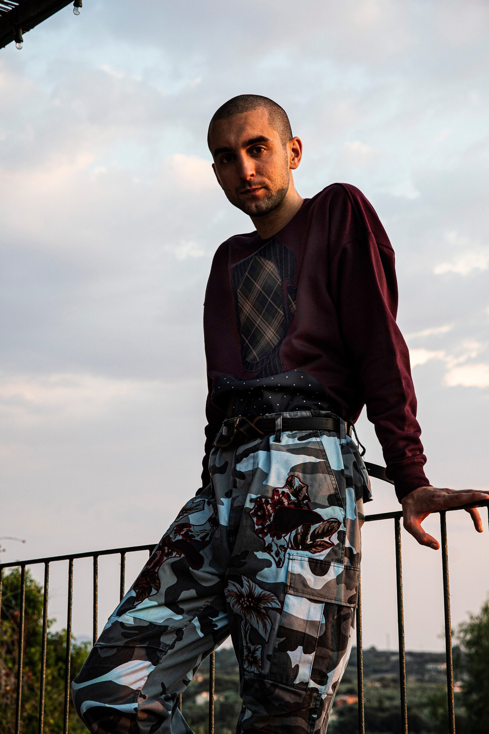 maroon relaxed sweater and cargo pants