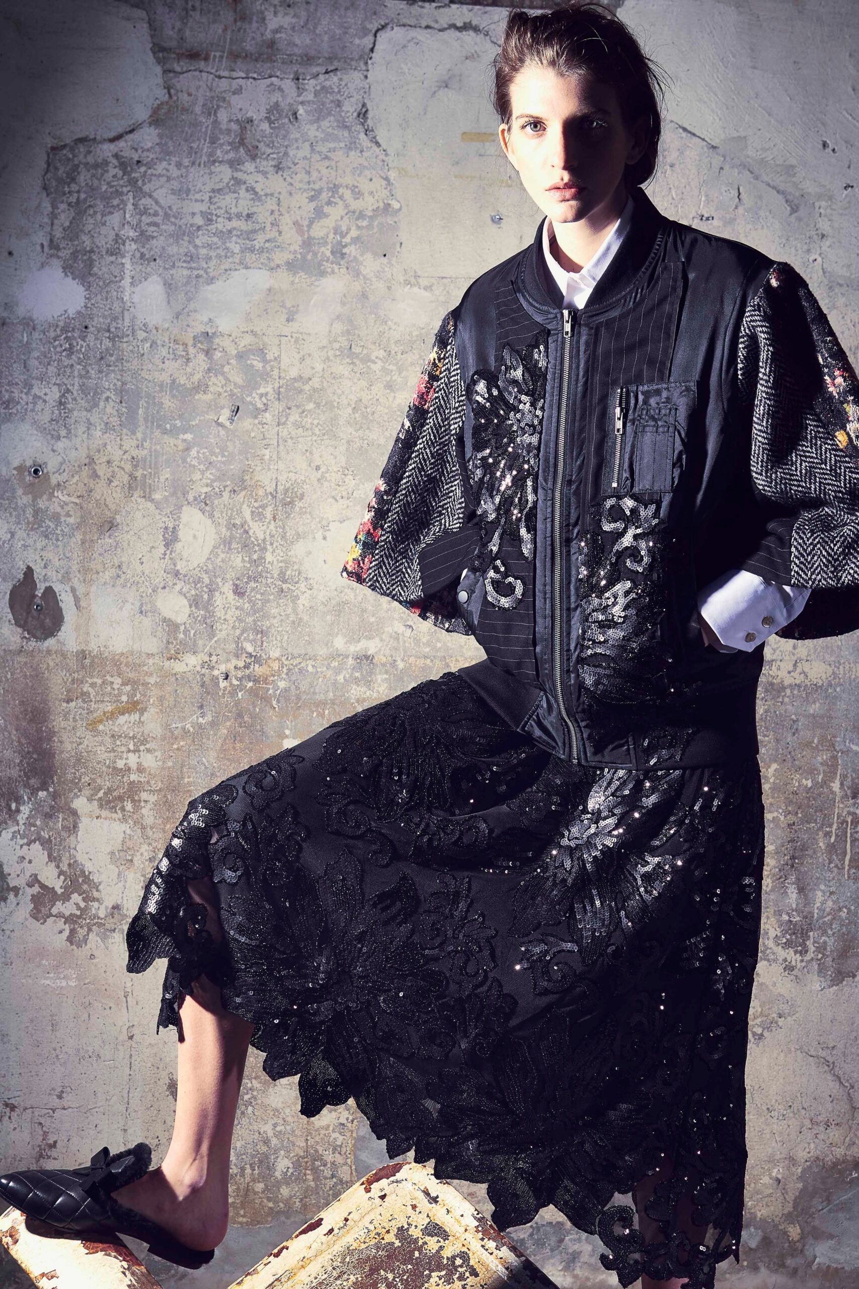 black embroidered jacket and lace skirt