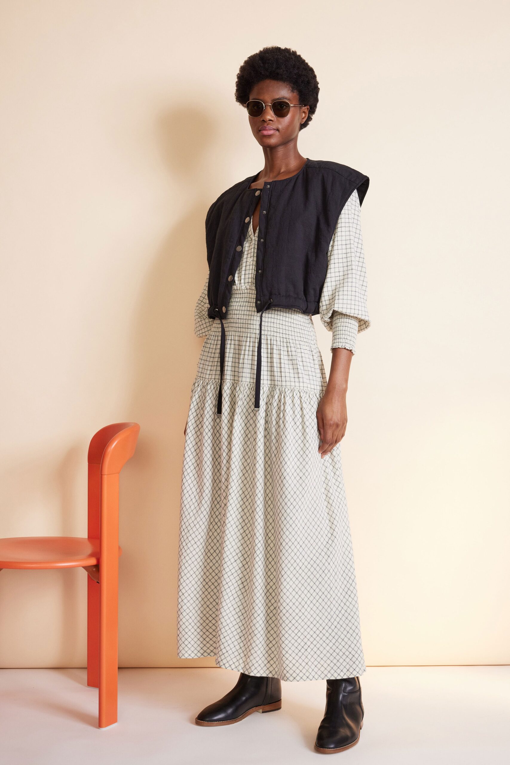 white tiered maxi dress with black jacket