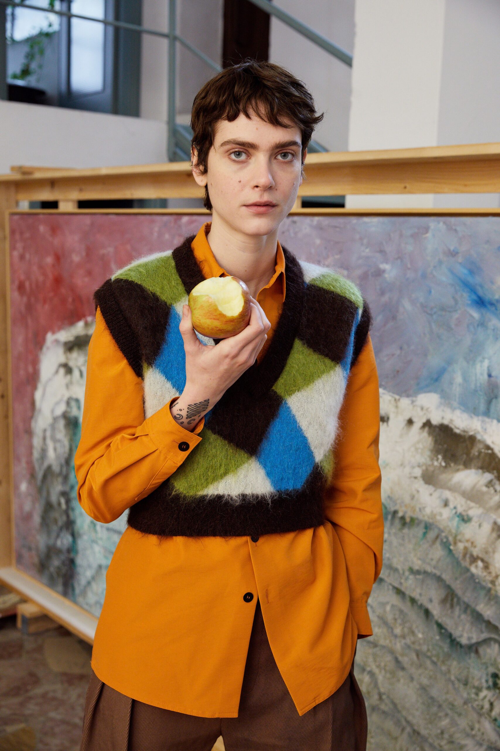 orange shirt with wool vest