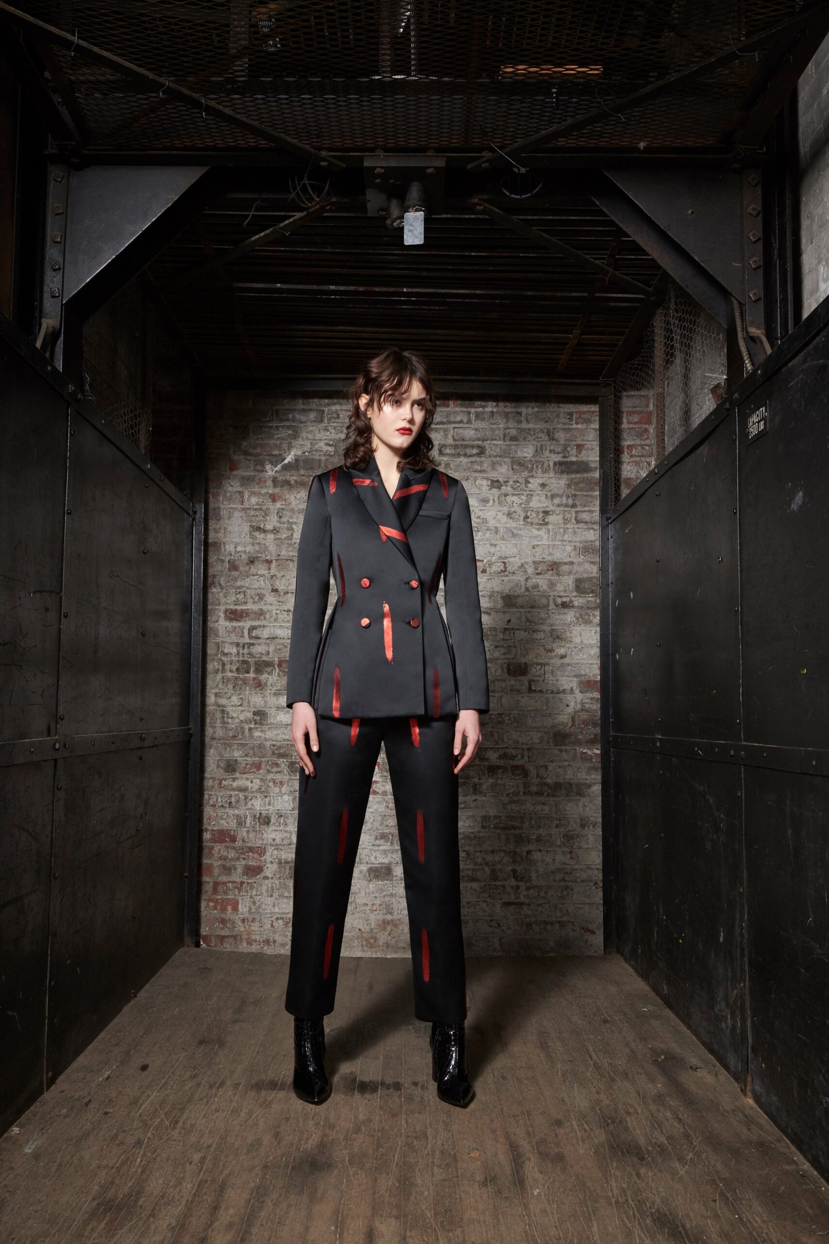 black and red tailored suit