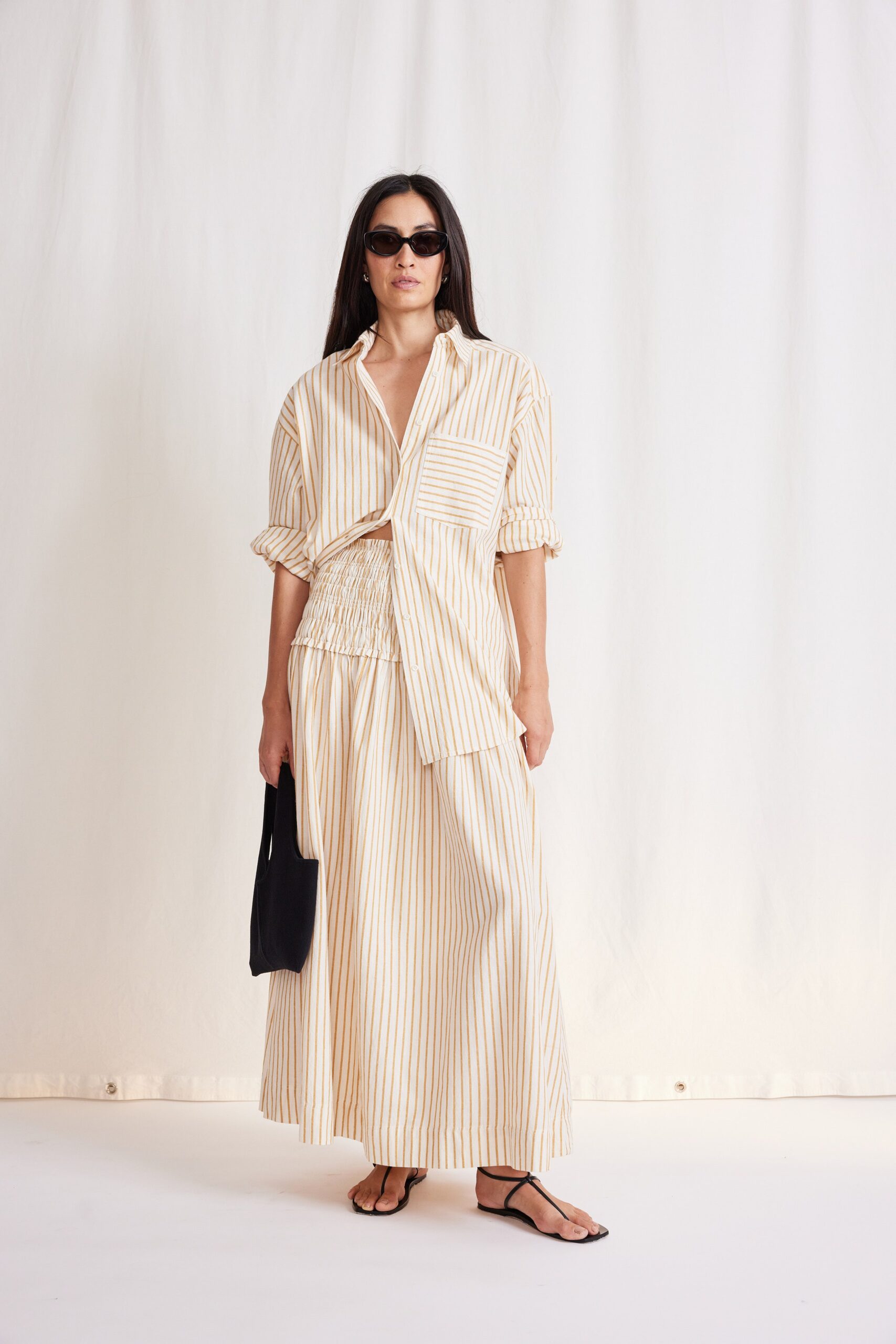 beige striped shirt and maxi skirt