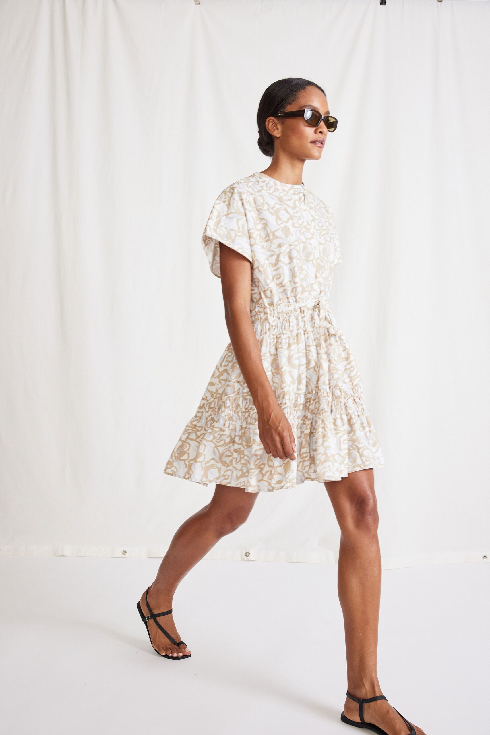 beige printed mini dress