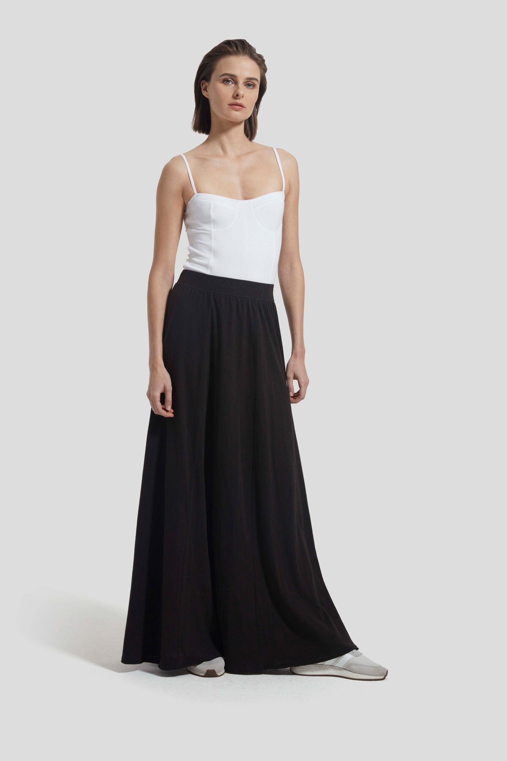 white fitted top with black maxi skirt
