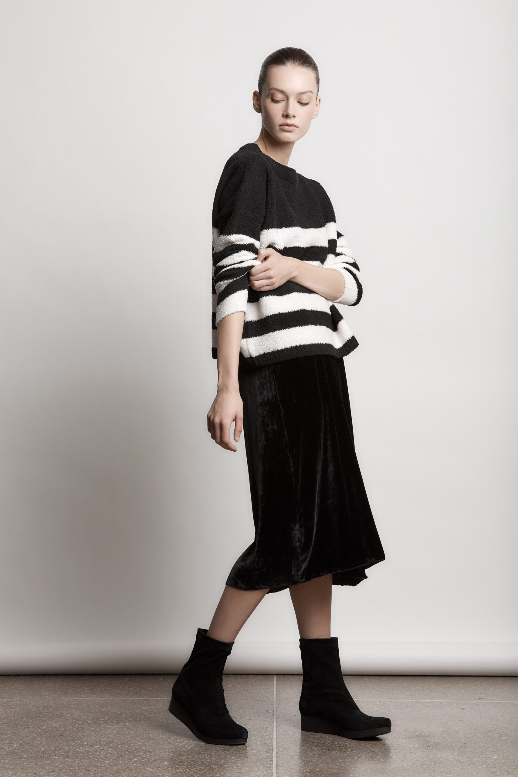 black and white striped sweater with midi skirt