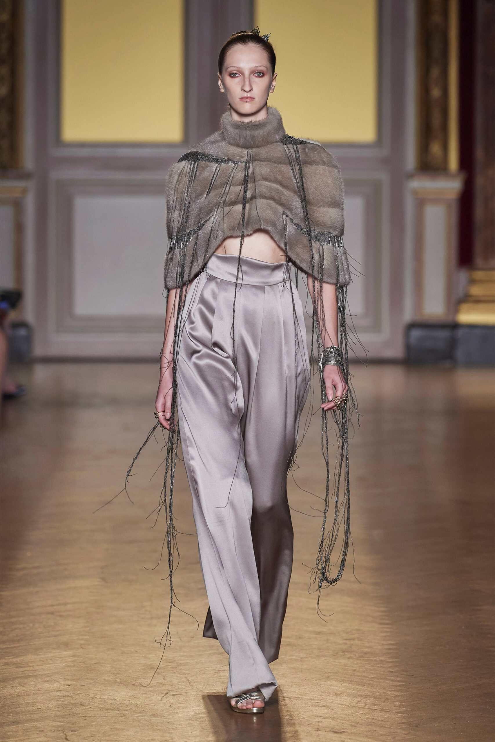 gray fur top and silver silk pants