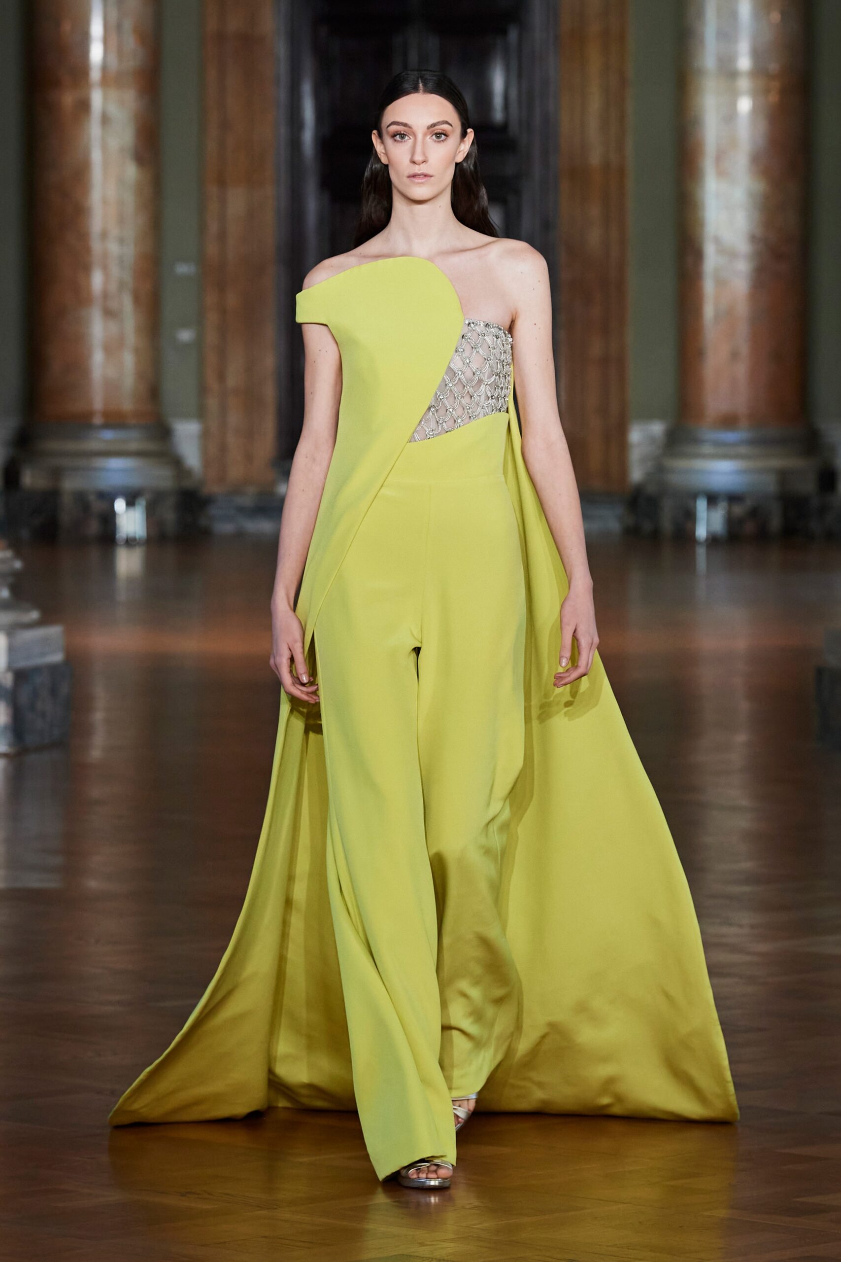 yellow asymmetric jumpsuit with cape