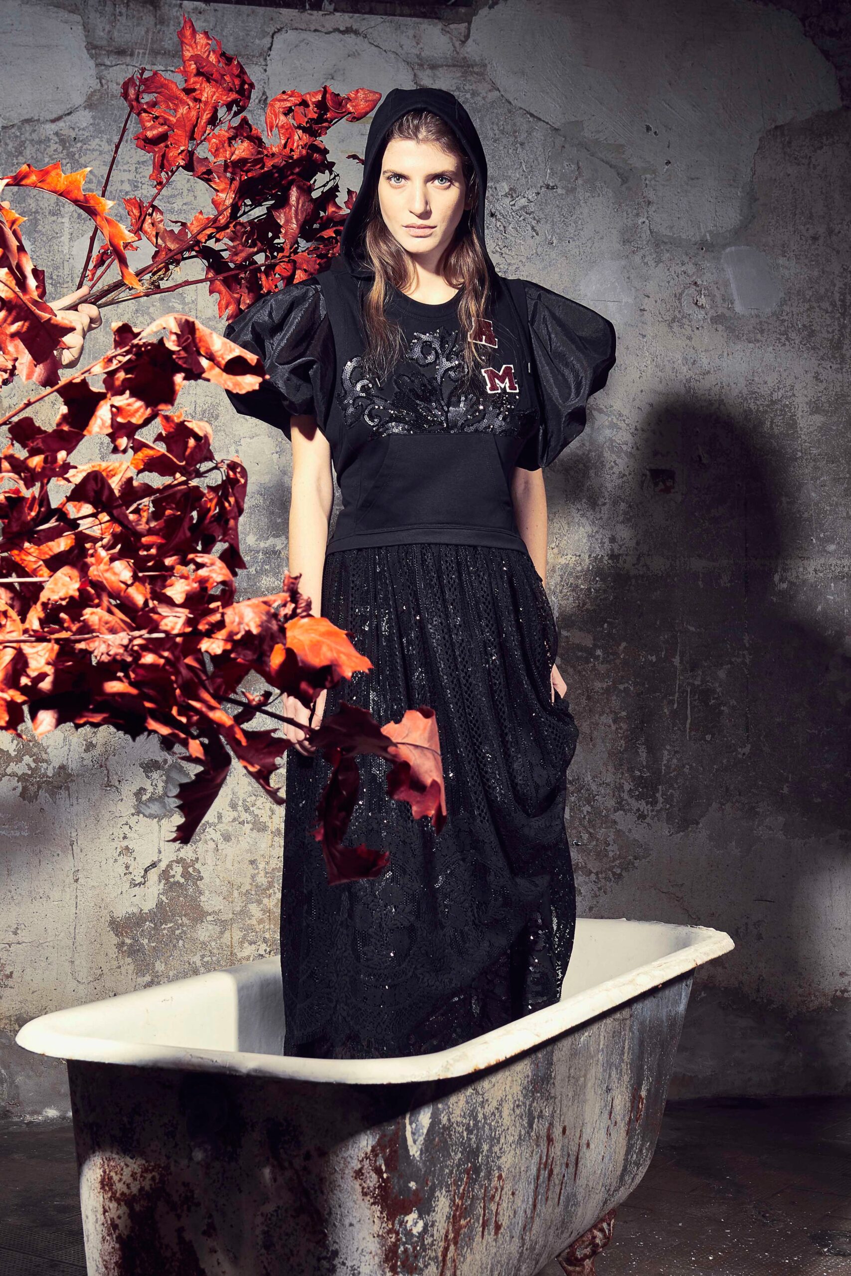 black embroidered top with lace skirt