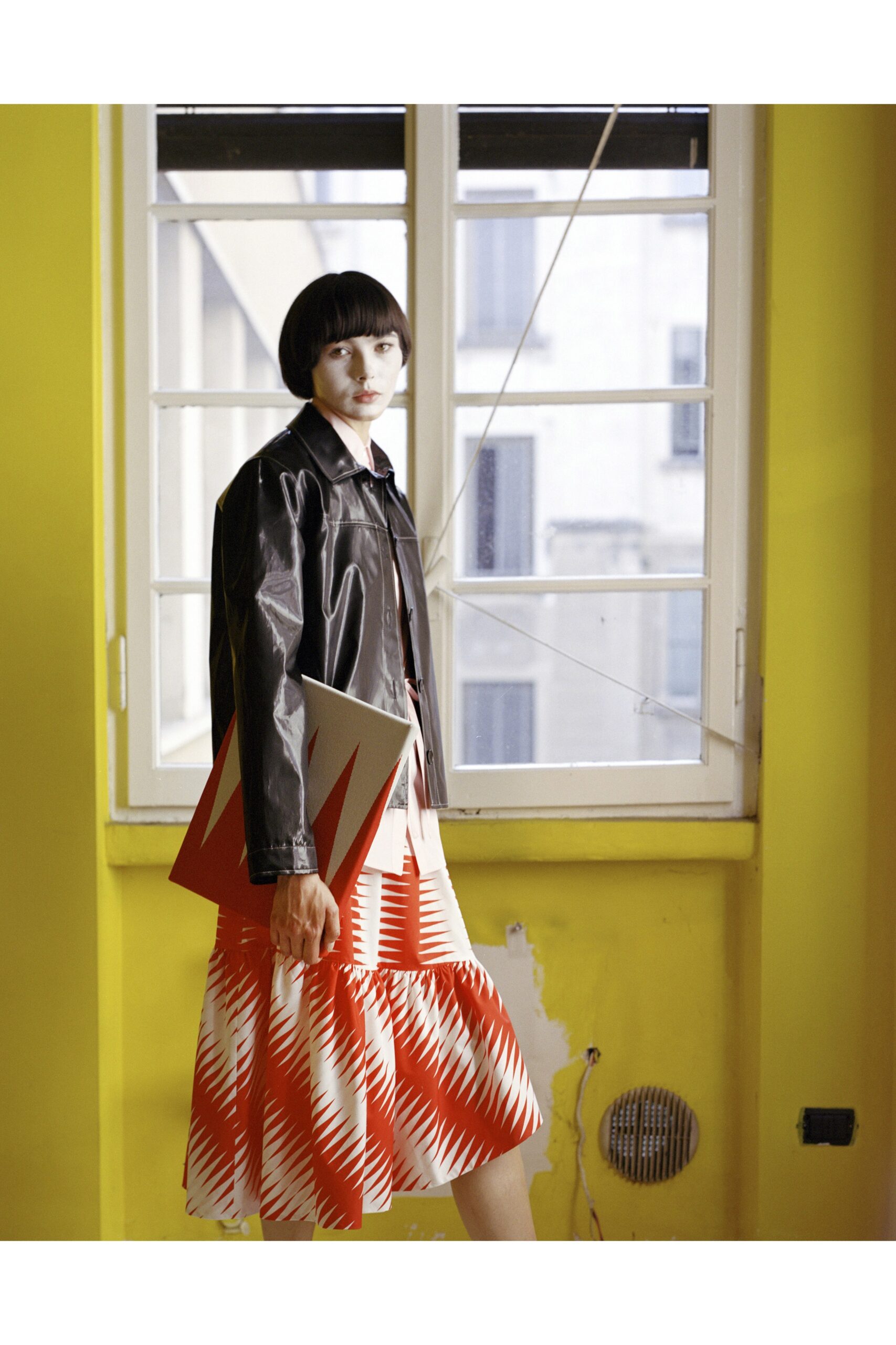 black leather jacket with red dress