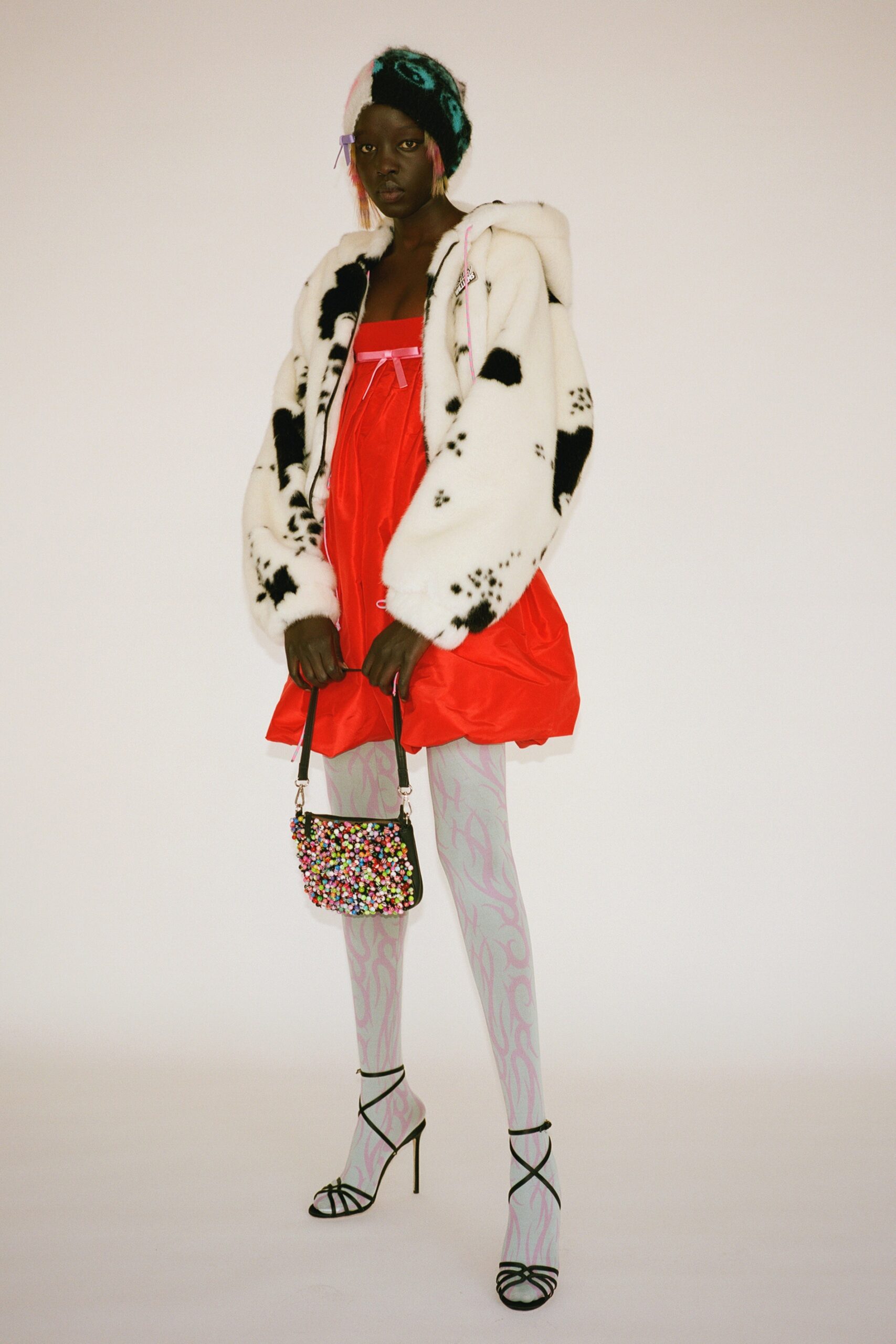 faux-fur coat and red mini dress