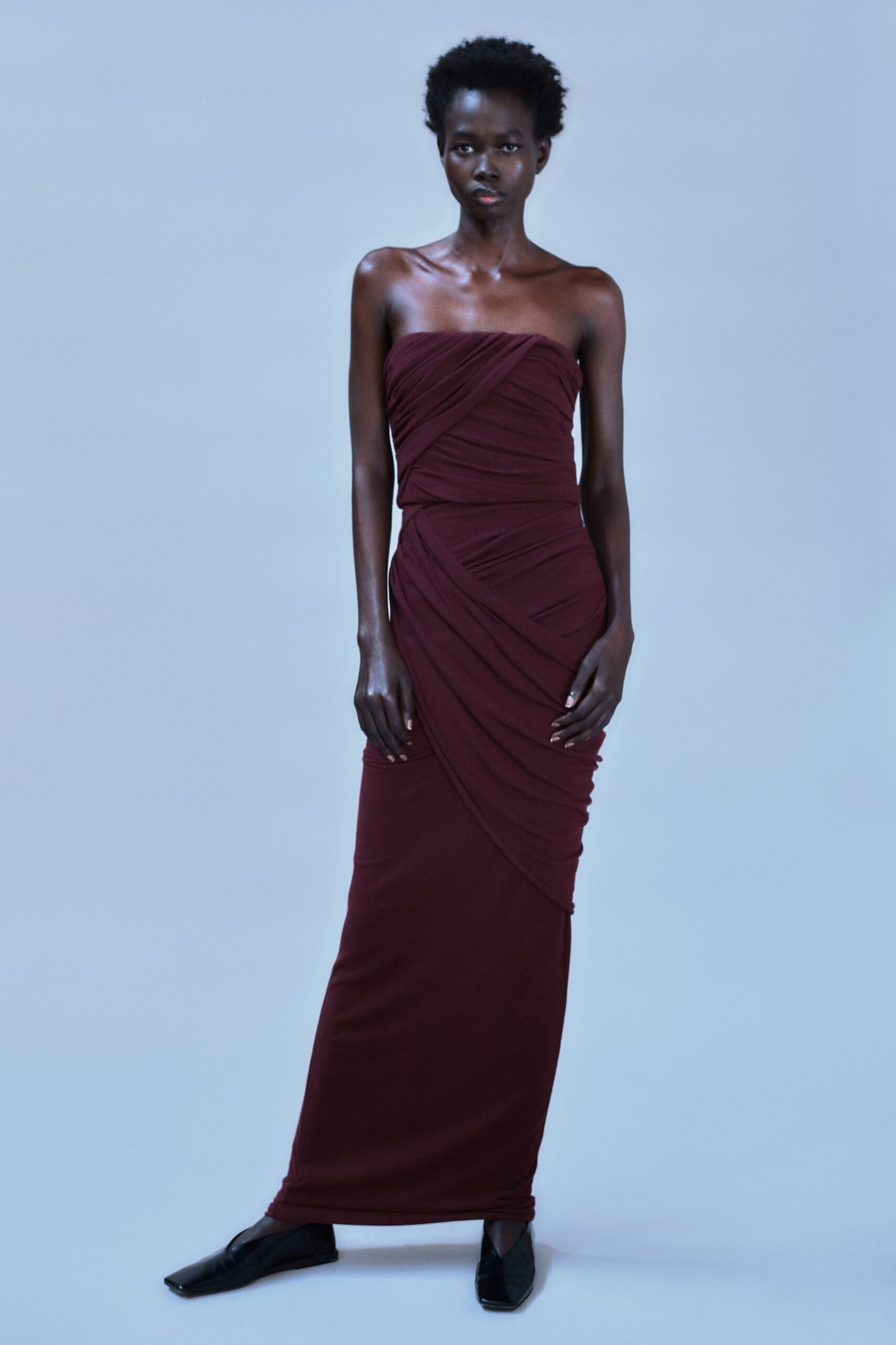 fitted maroon strapless gown