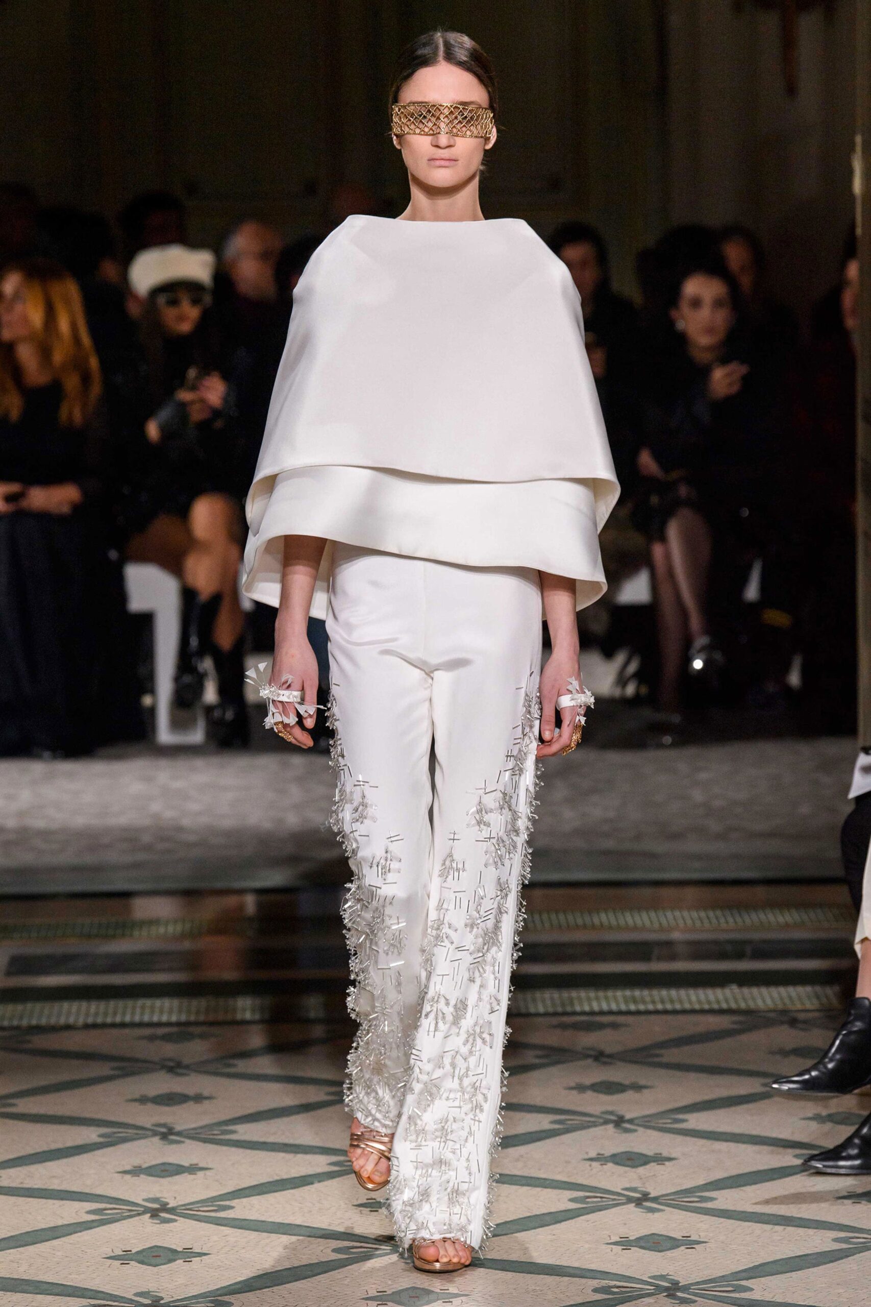 white silk draped top and fitted pants