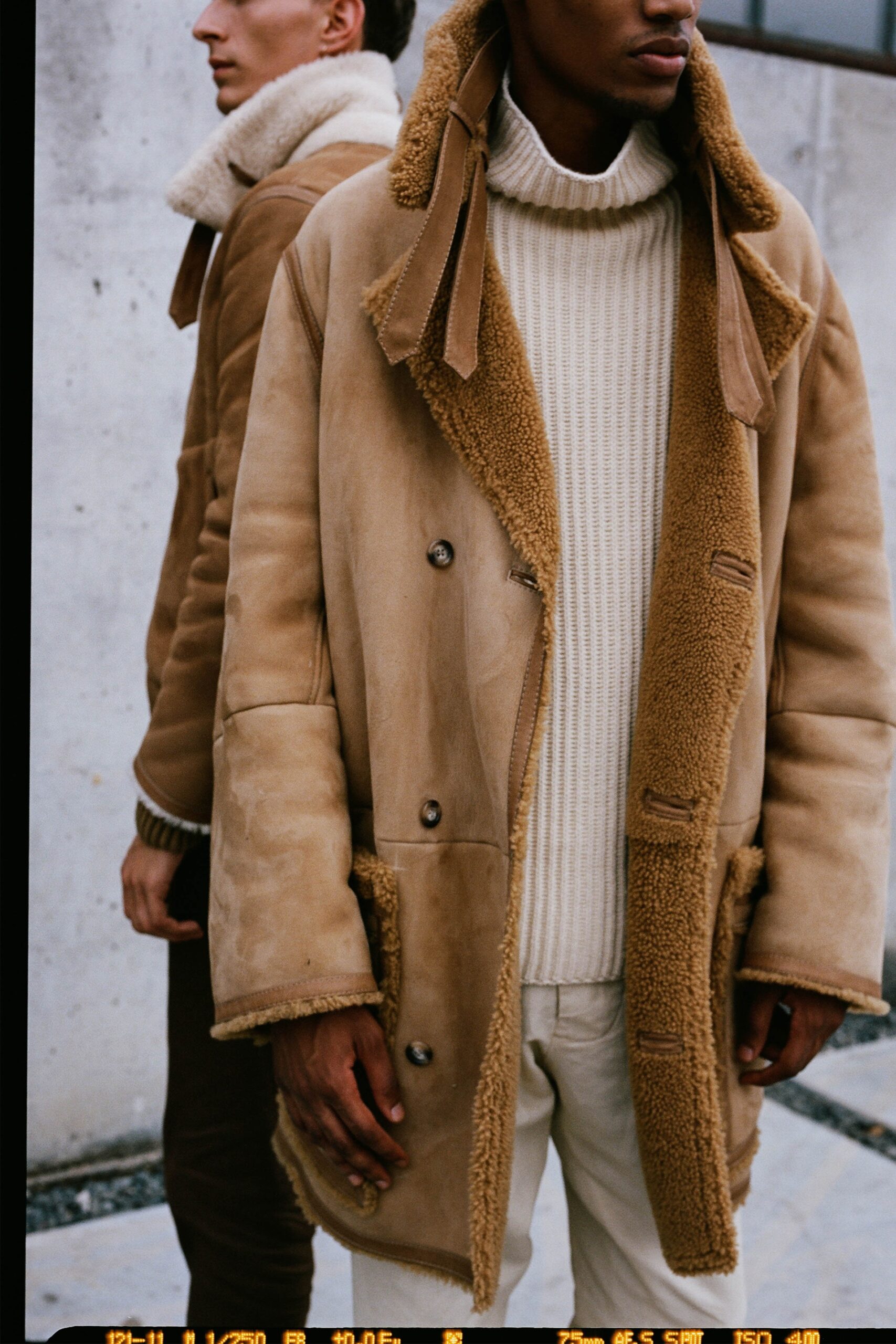 brown leather long-sleeve collared relaxed buttoned coat
