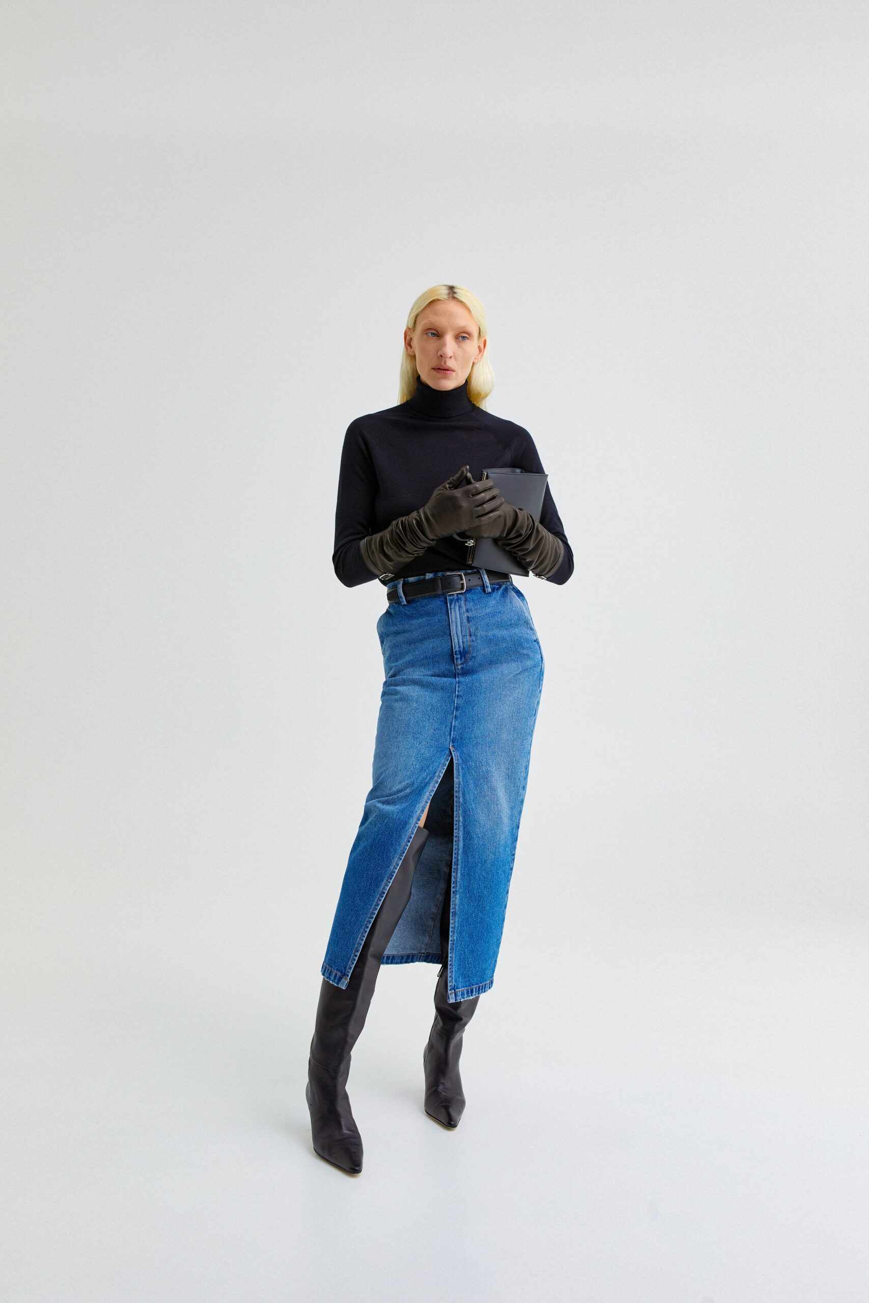 black turtleneck top with denim skirt
