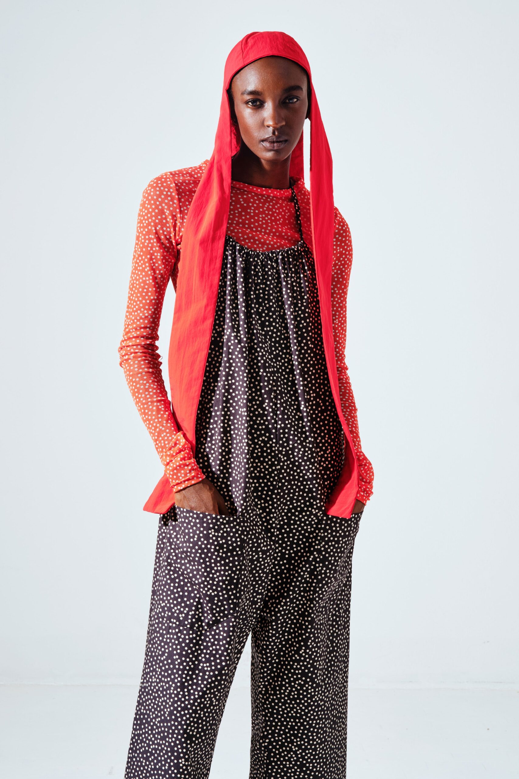 red polka-dot top and jumpsuit