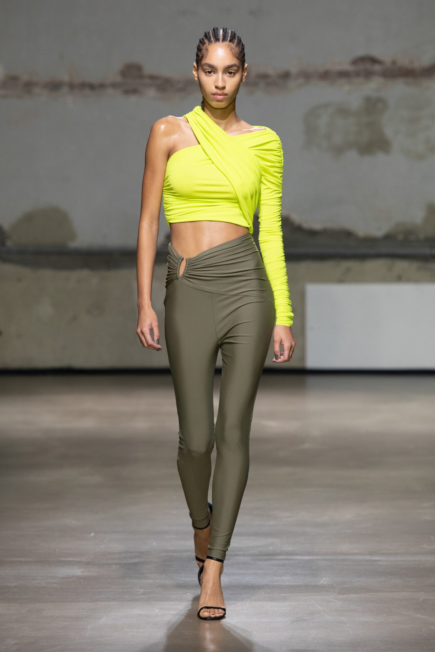 fitted neon yellow top with olive green pants