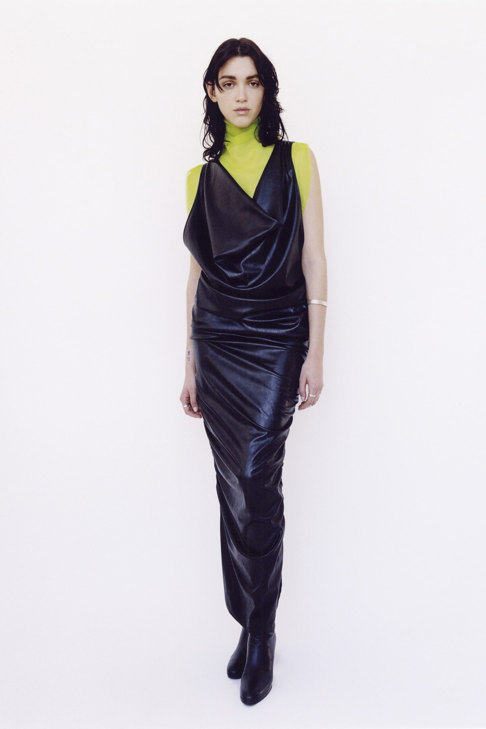 black leather midi dress and green silk top