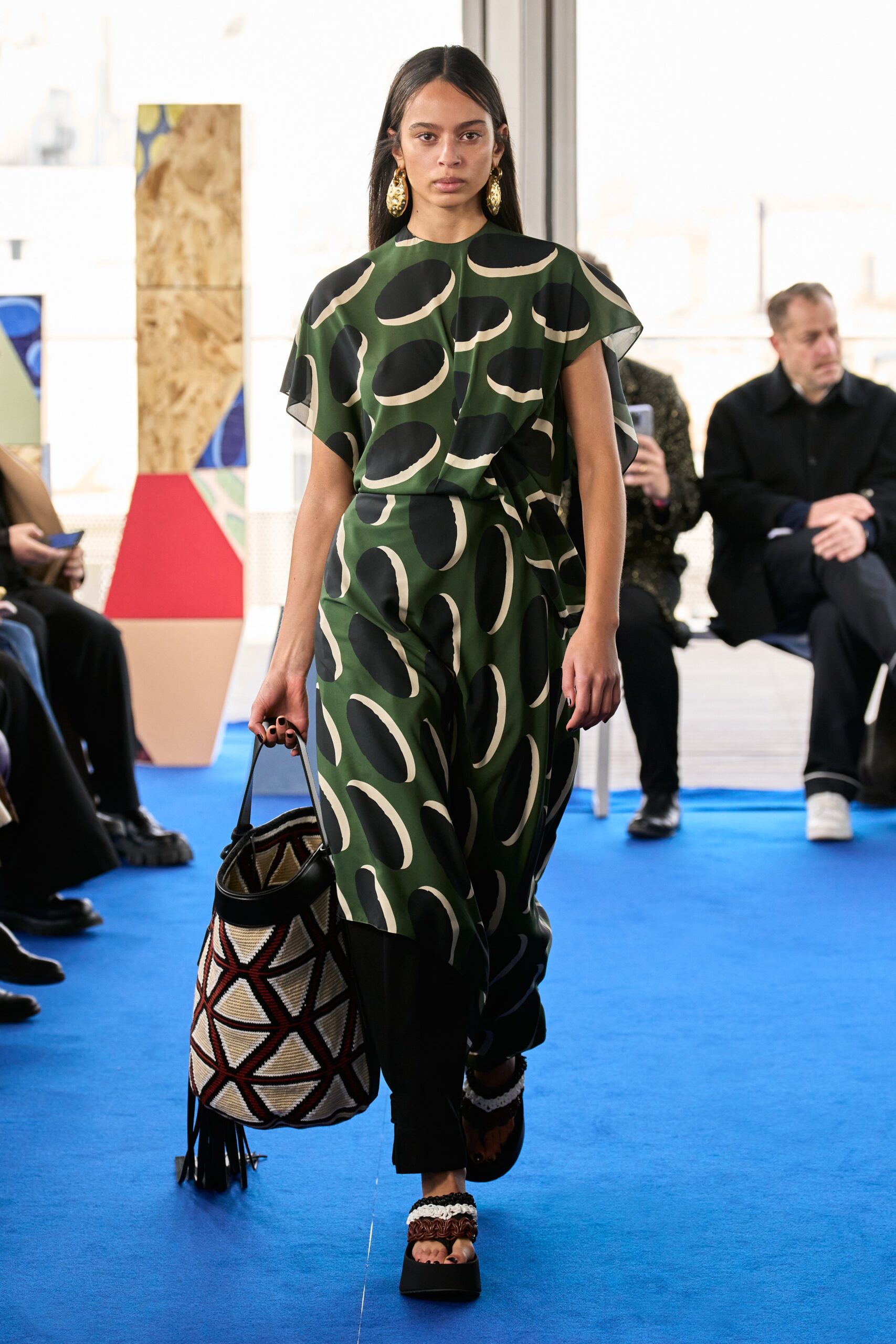green printed midi dress with bag