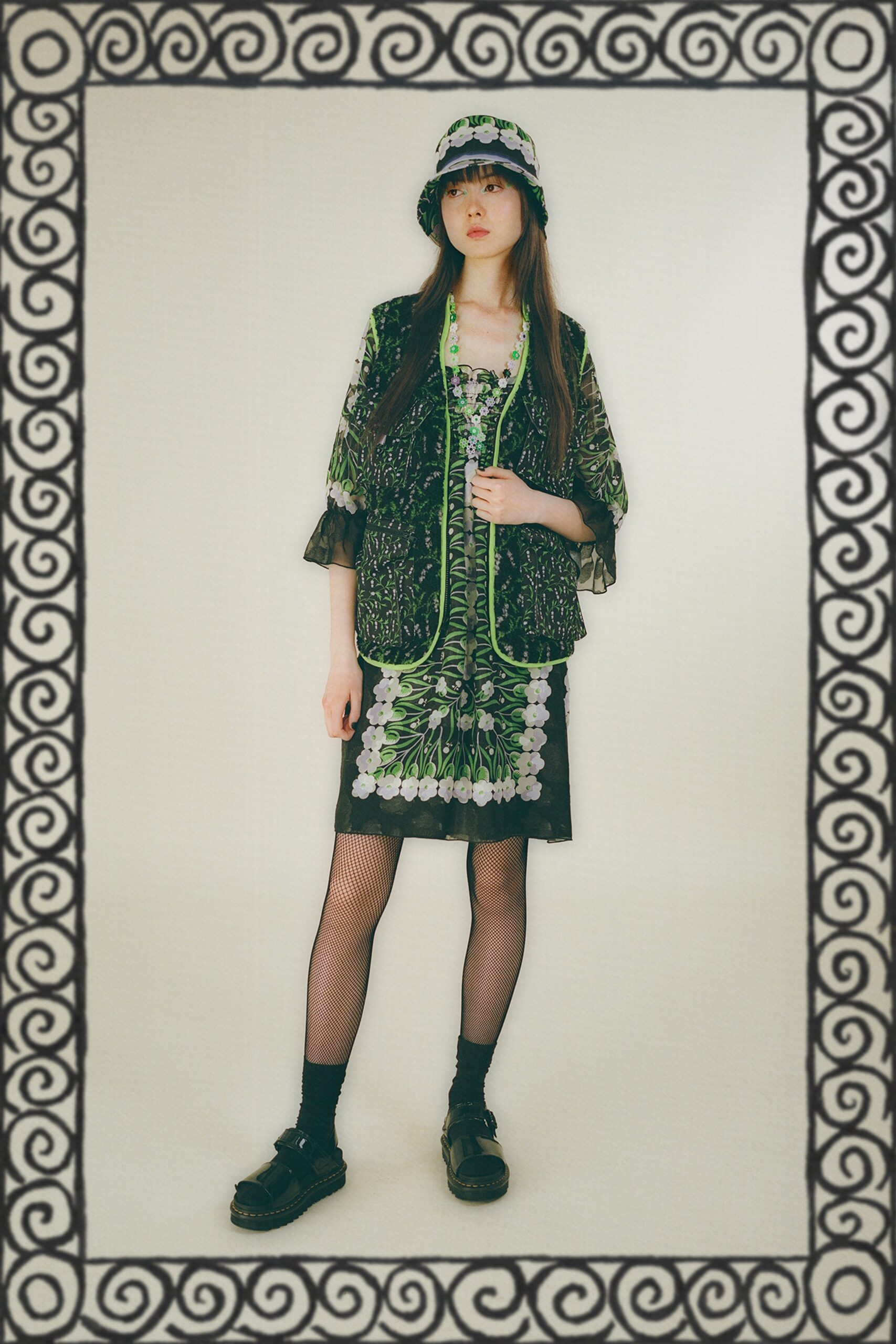 black and green printed dress with jacket