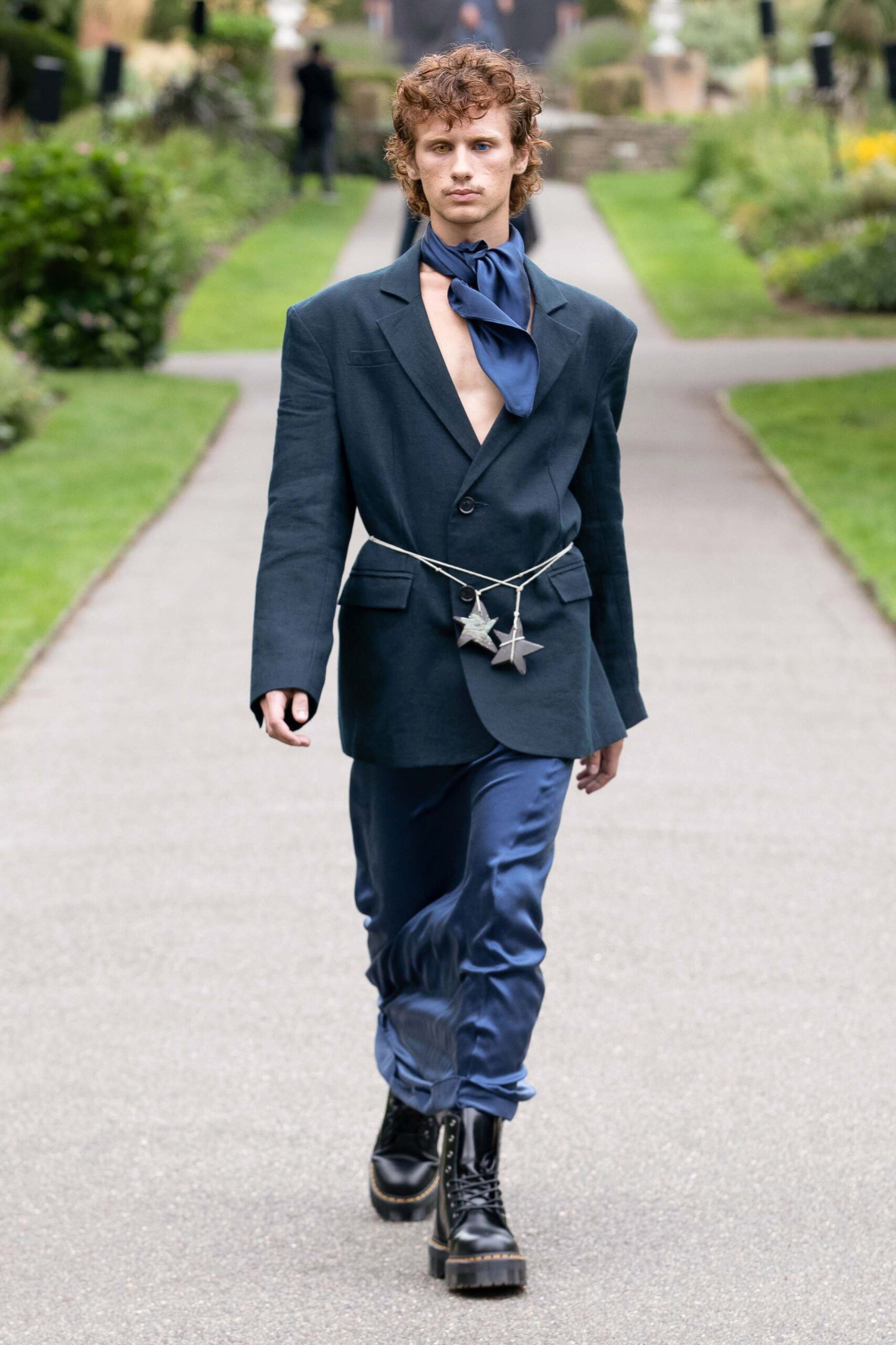 black blazer with blue pants