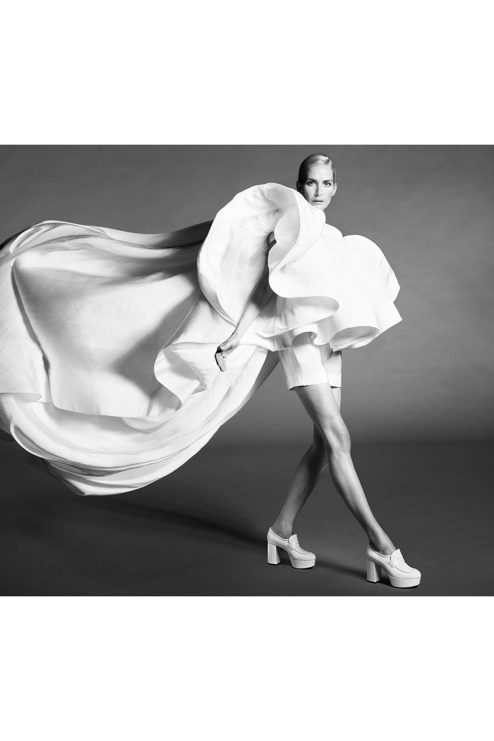 white flared mini dress with platform shoes