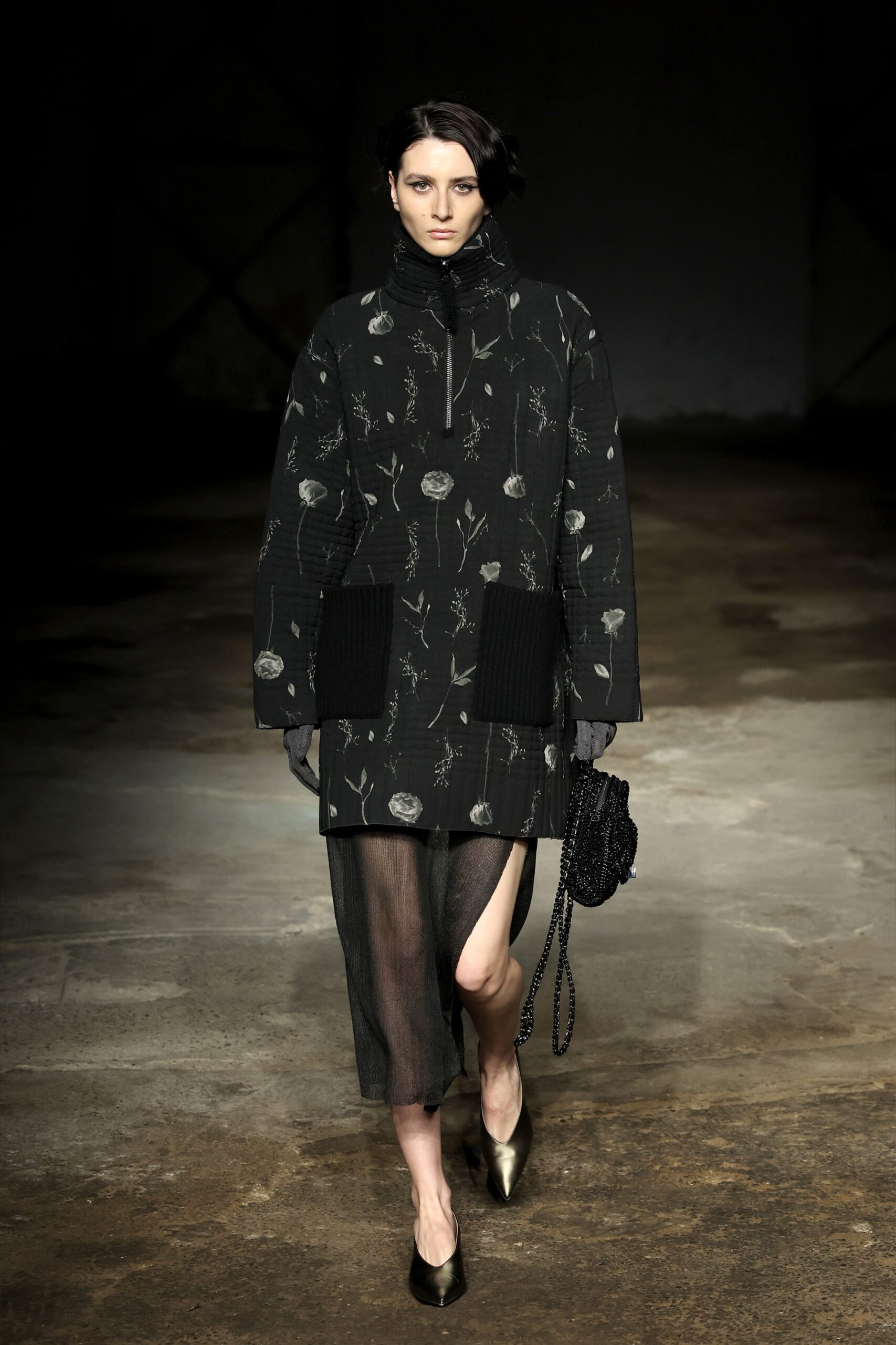 black relaxed coat with sheer skirt