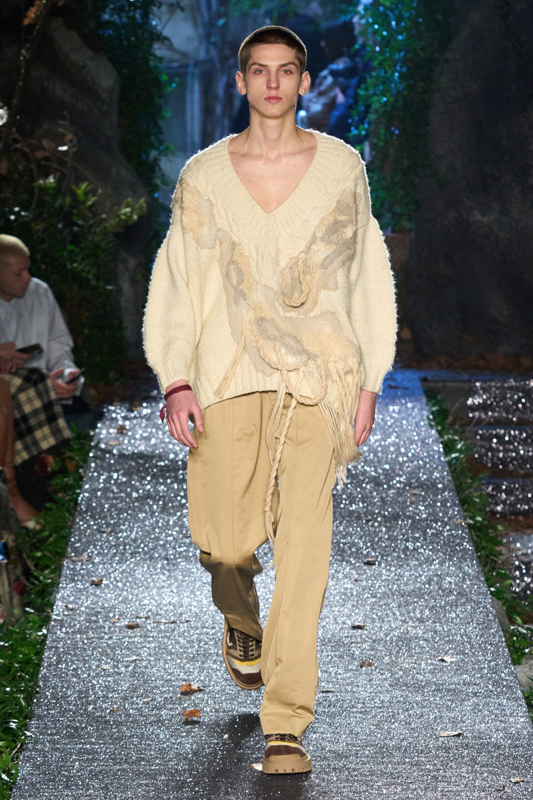 ivory wool relaxed sweater with beige pants