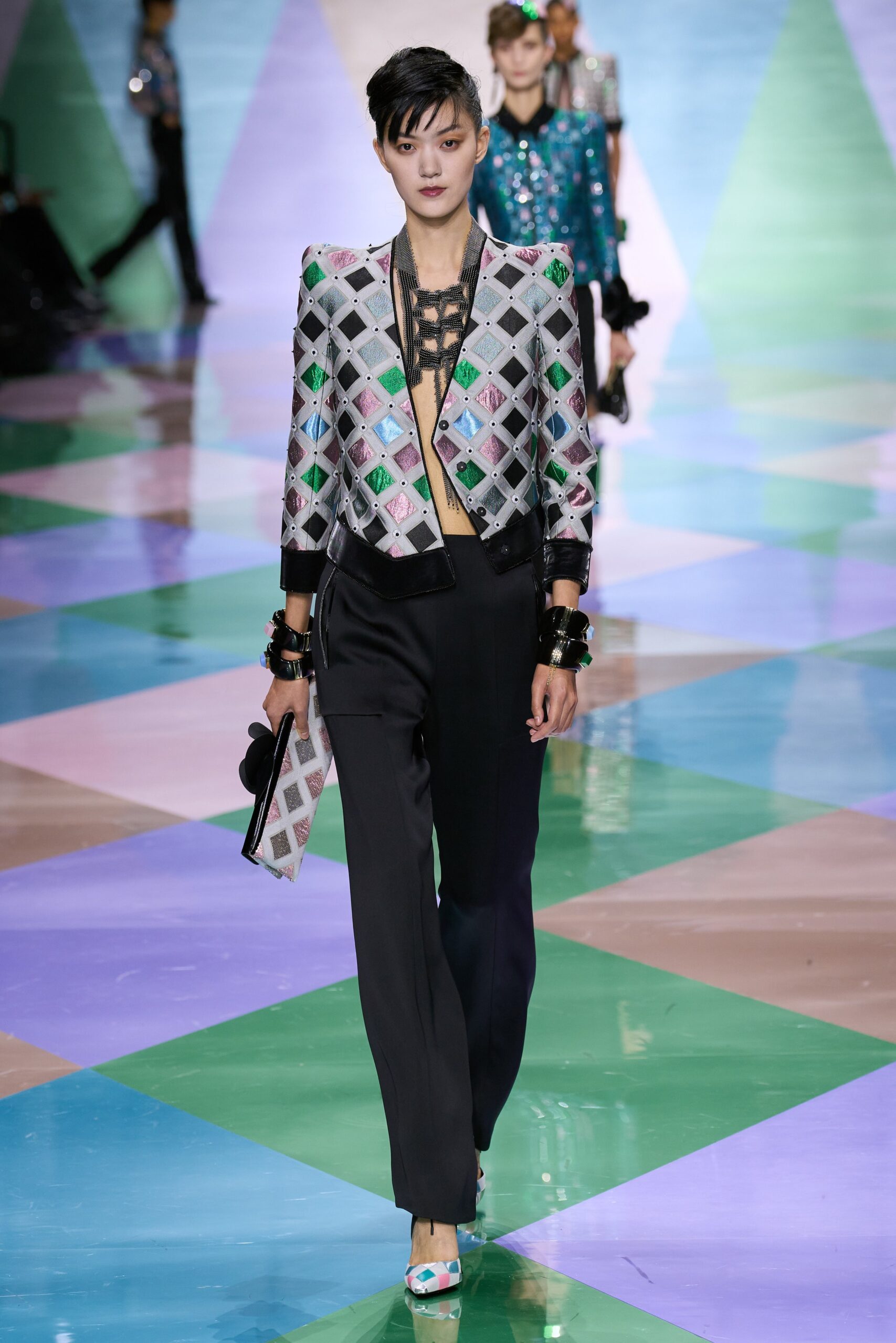 multi-colored tailored blazer and black pants