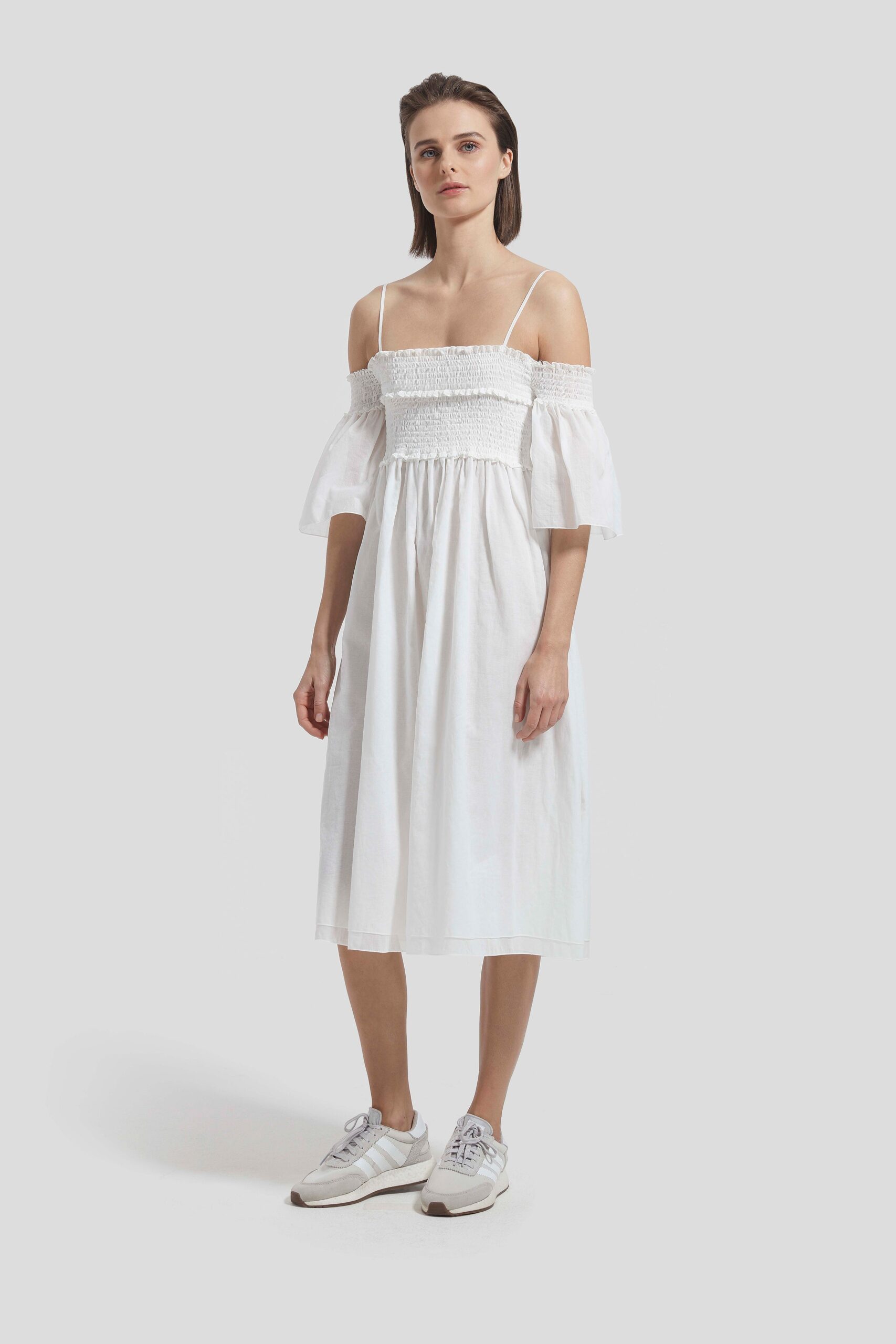 white off-shoulder midi dress with sneakers