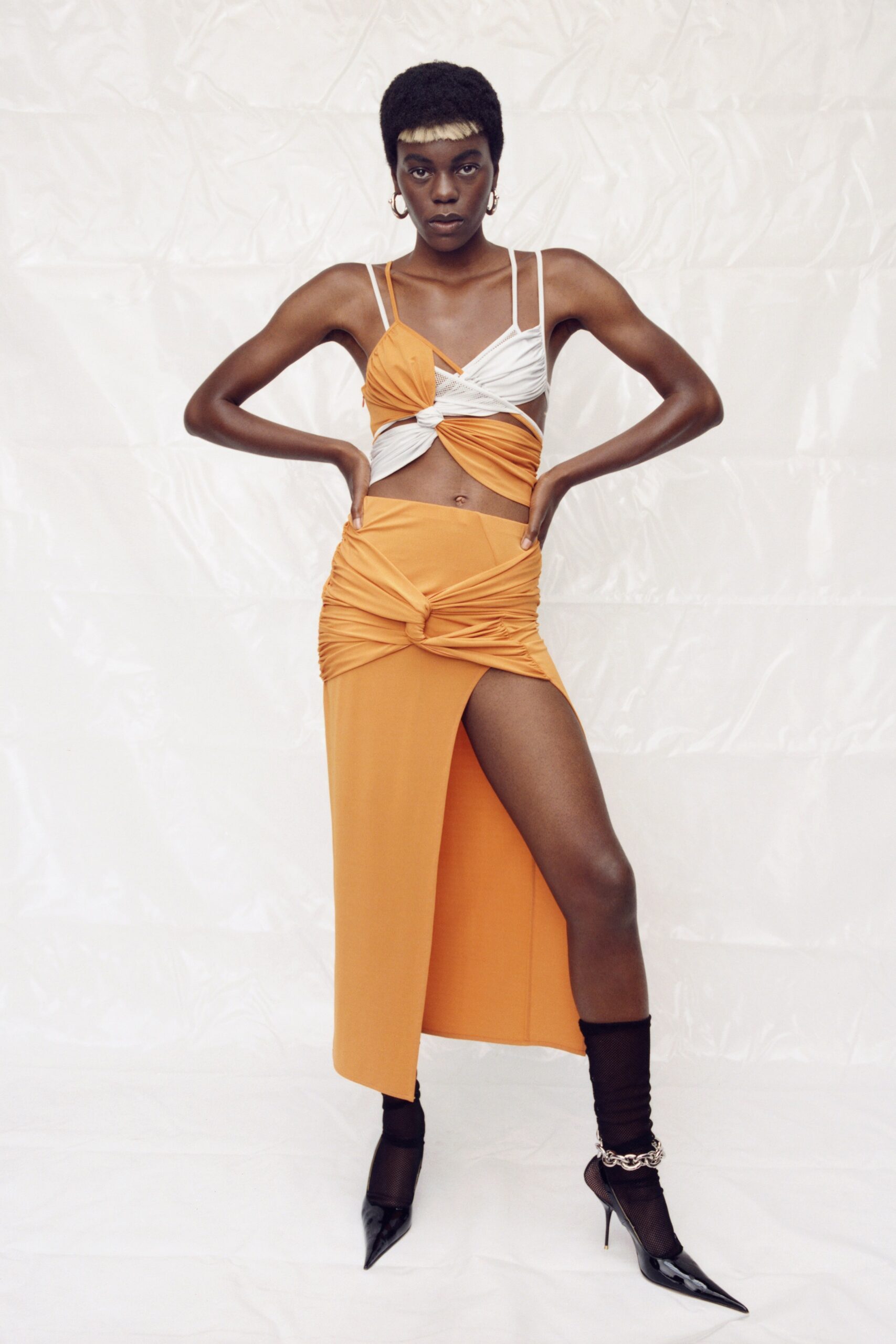 fitted orange top and skirt