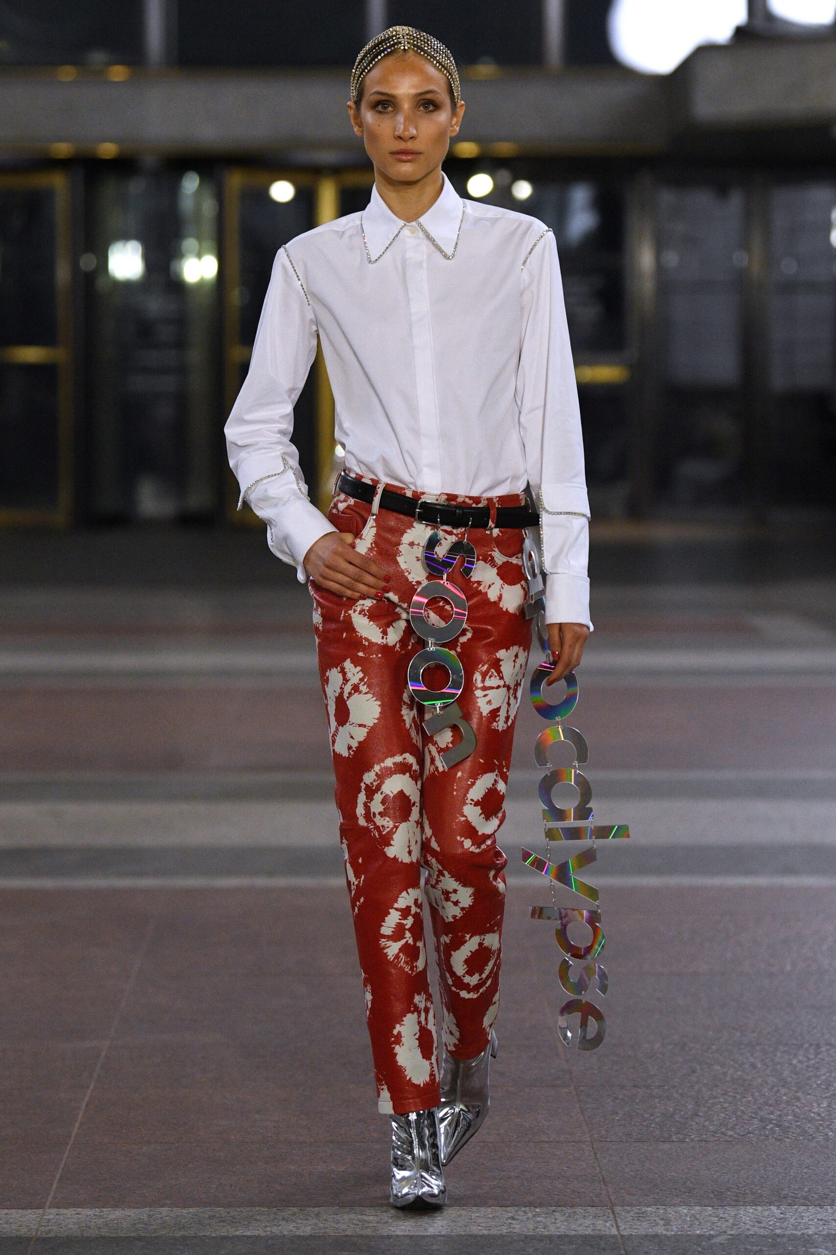 white fitted shirt with red pants