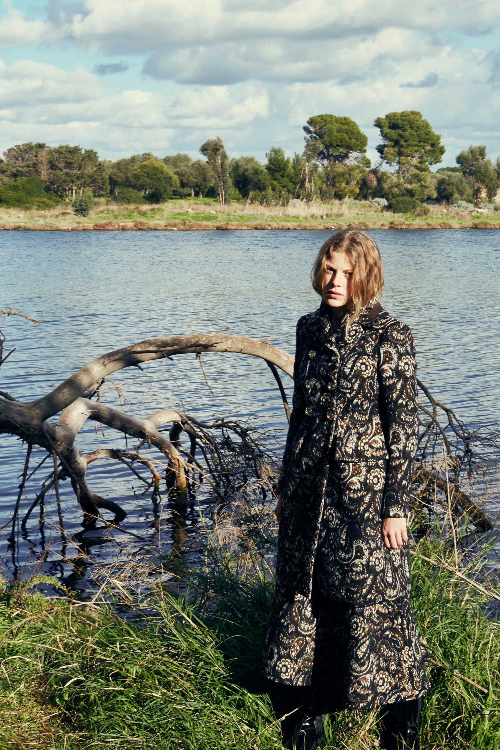 black and gold embroidered coat