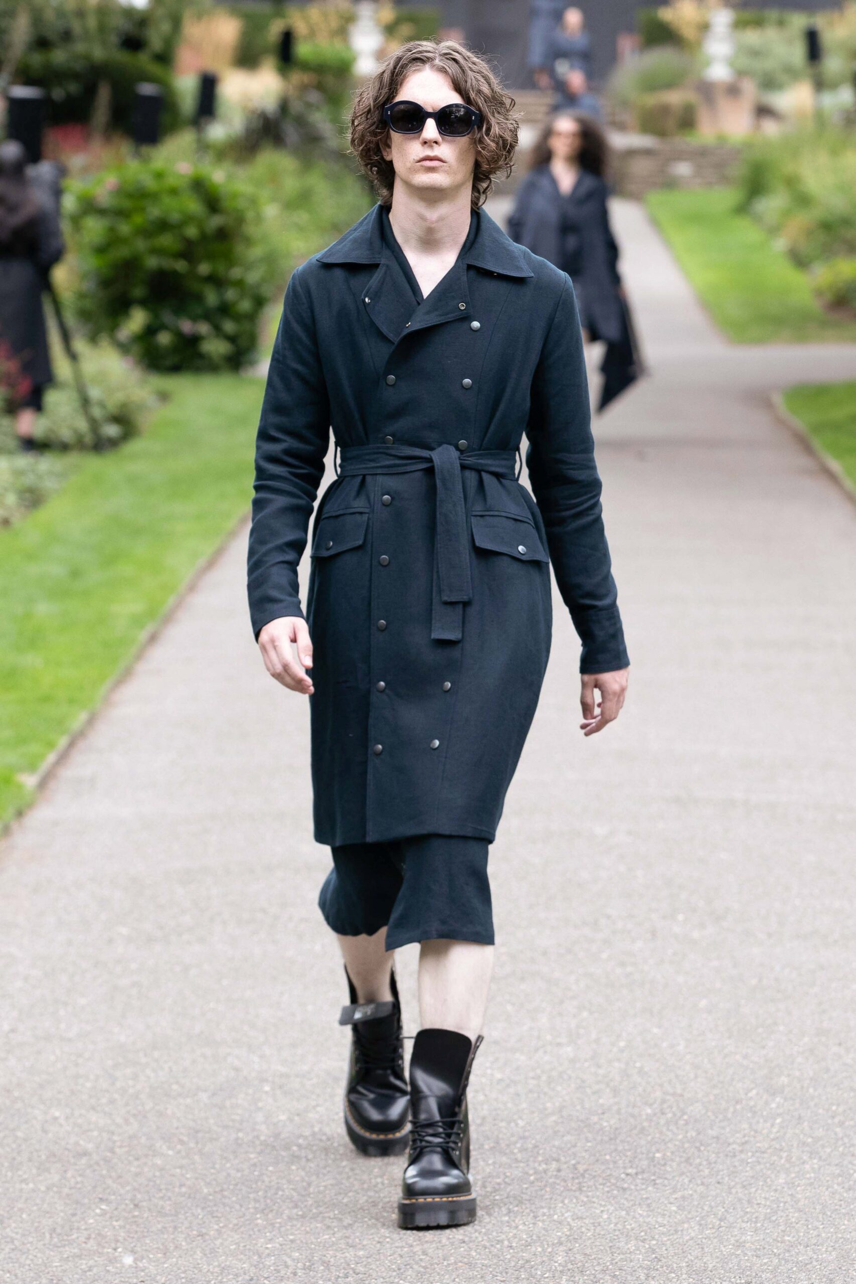 black trench coat with boots