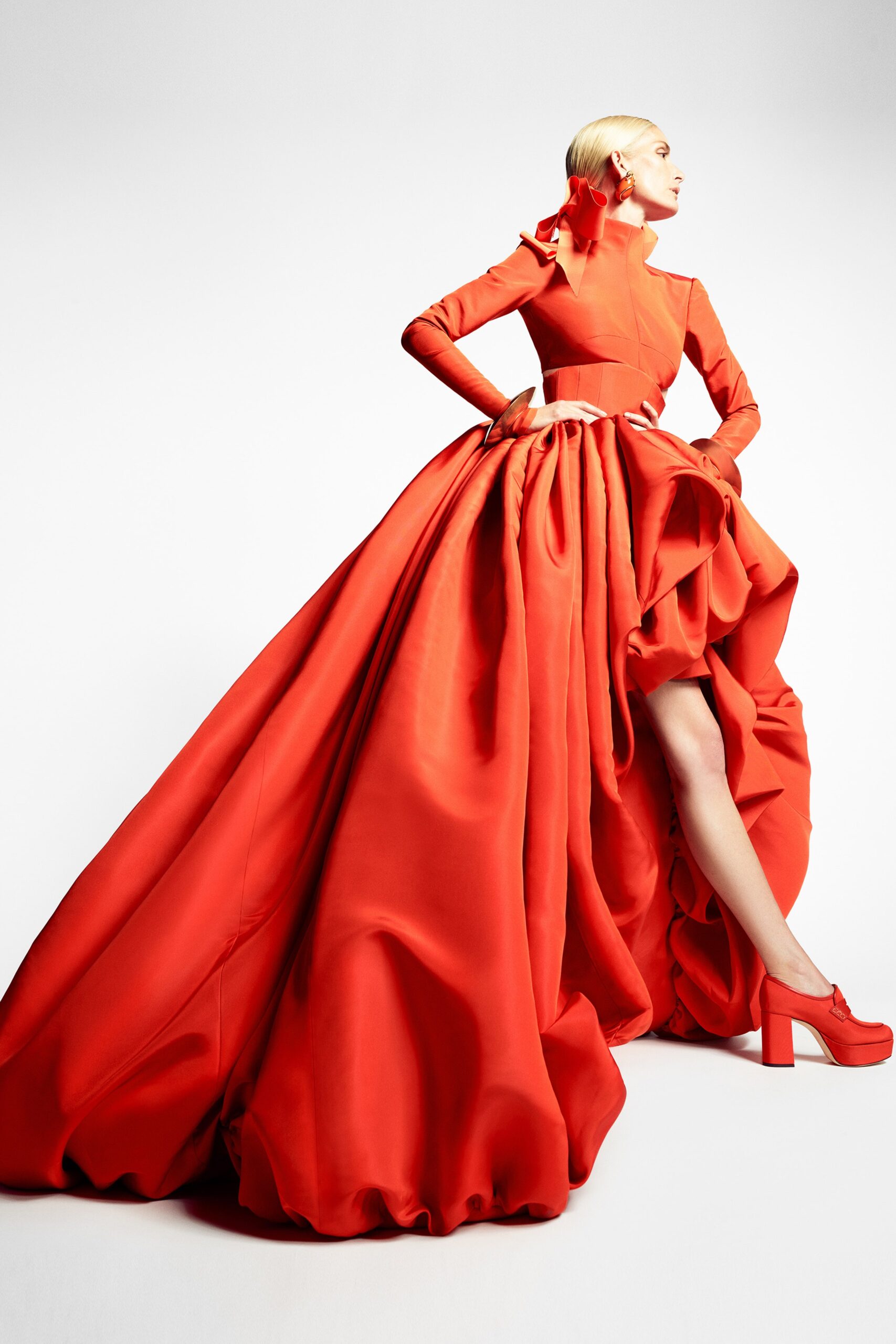 red silk long-sleeve gown