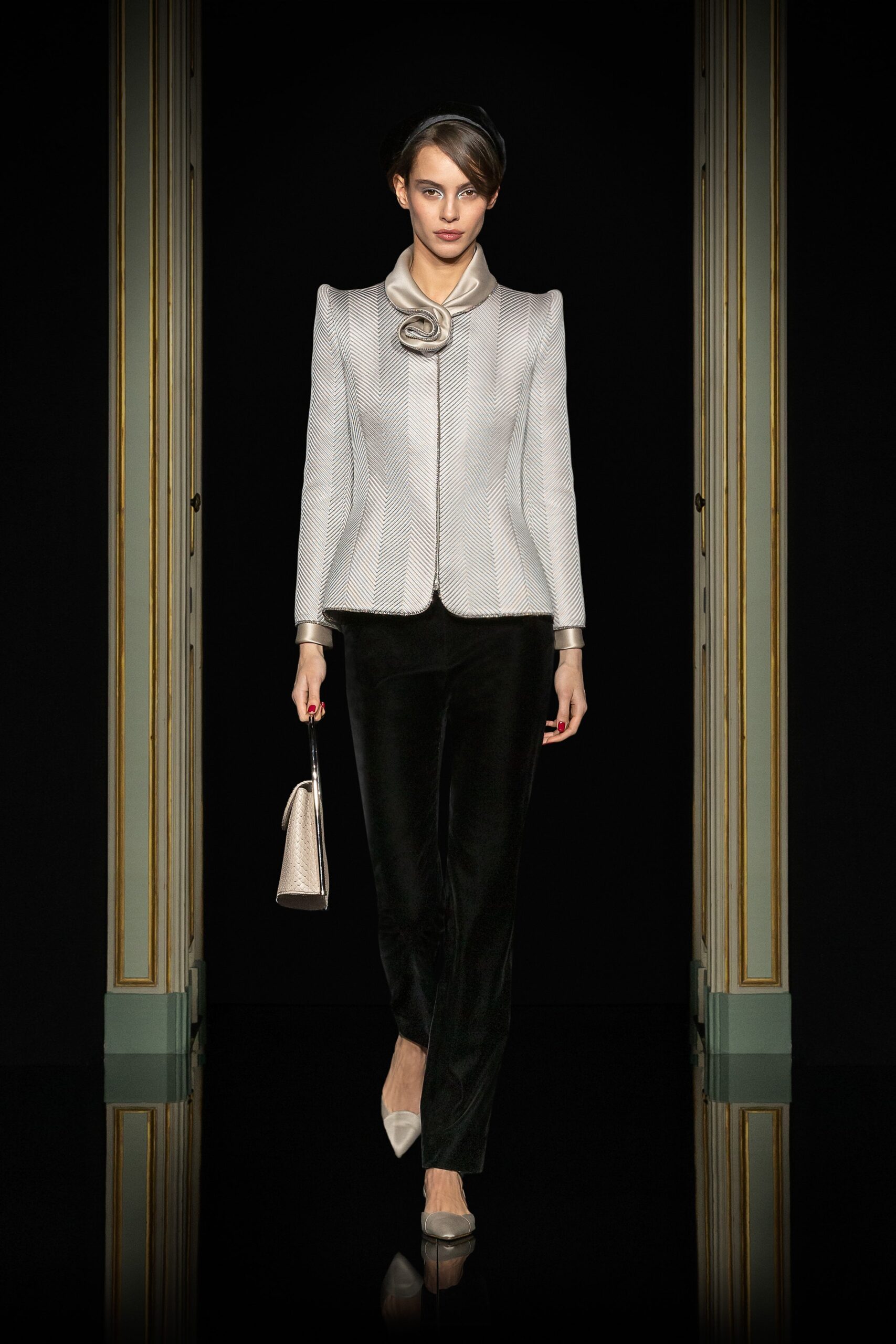 white tailored blazer with black pants