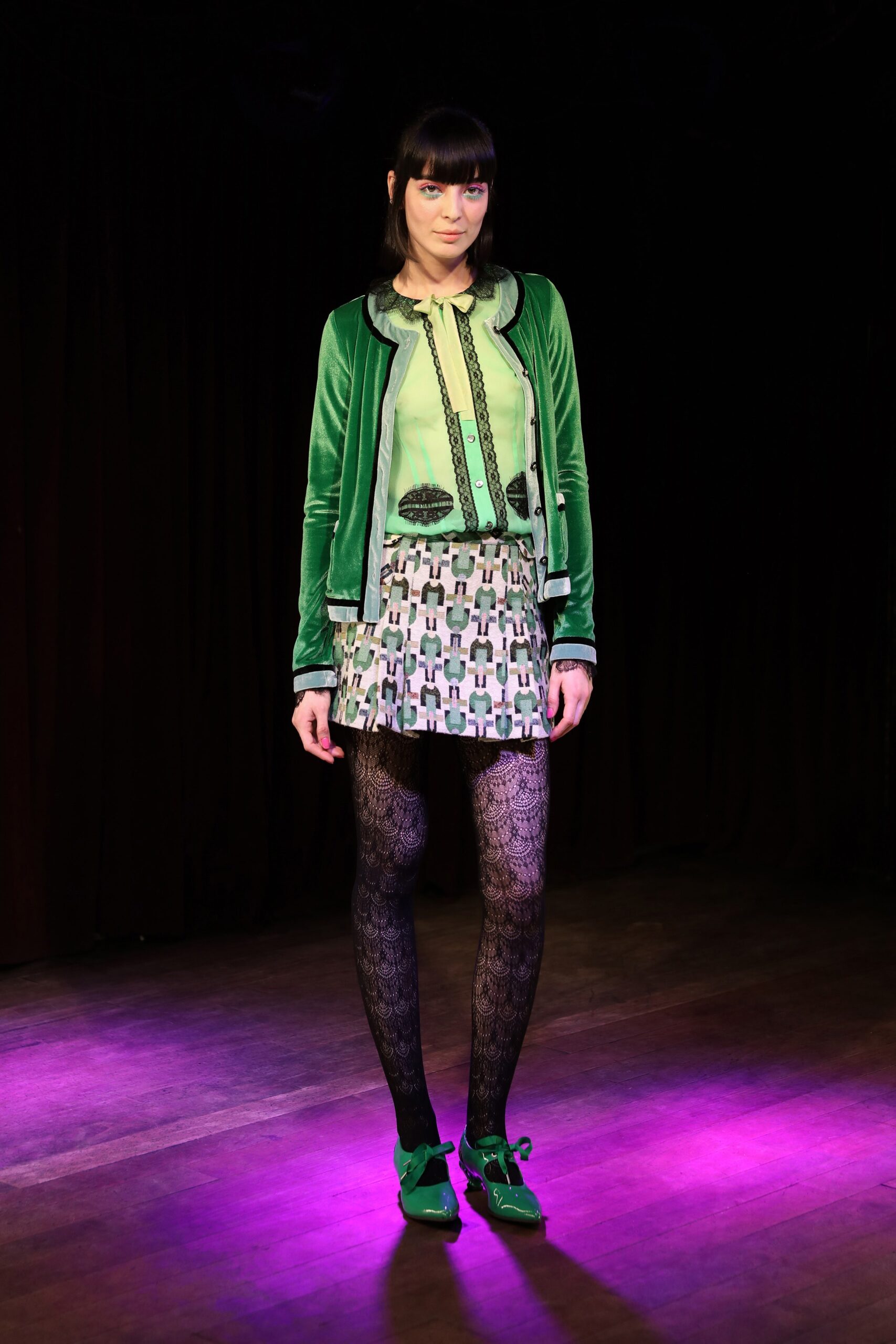 green velvet jacket with pleated skirt