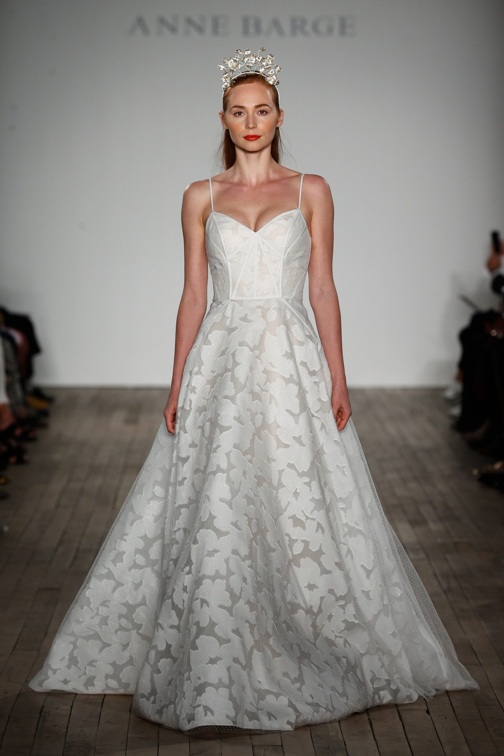 white embroidered sleeveless gown