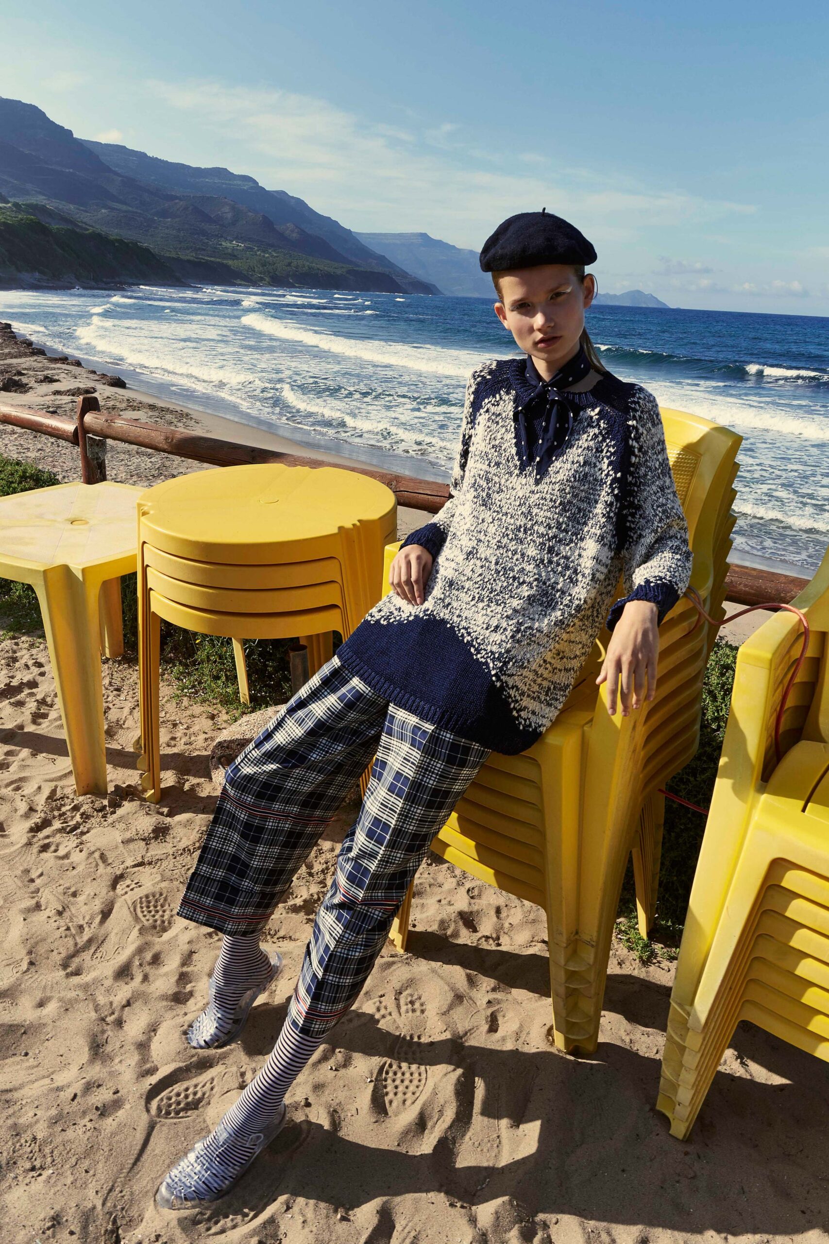 blue and white relaxed sweater with tailored pants