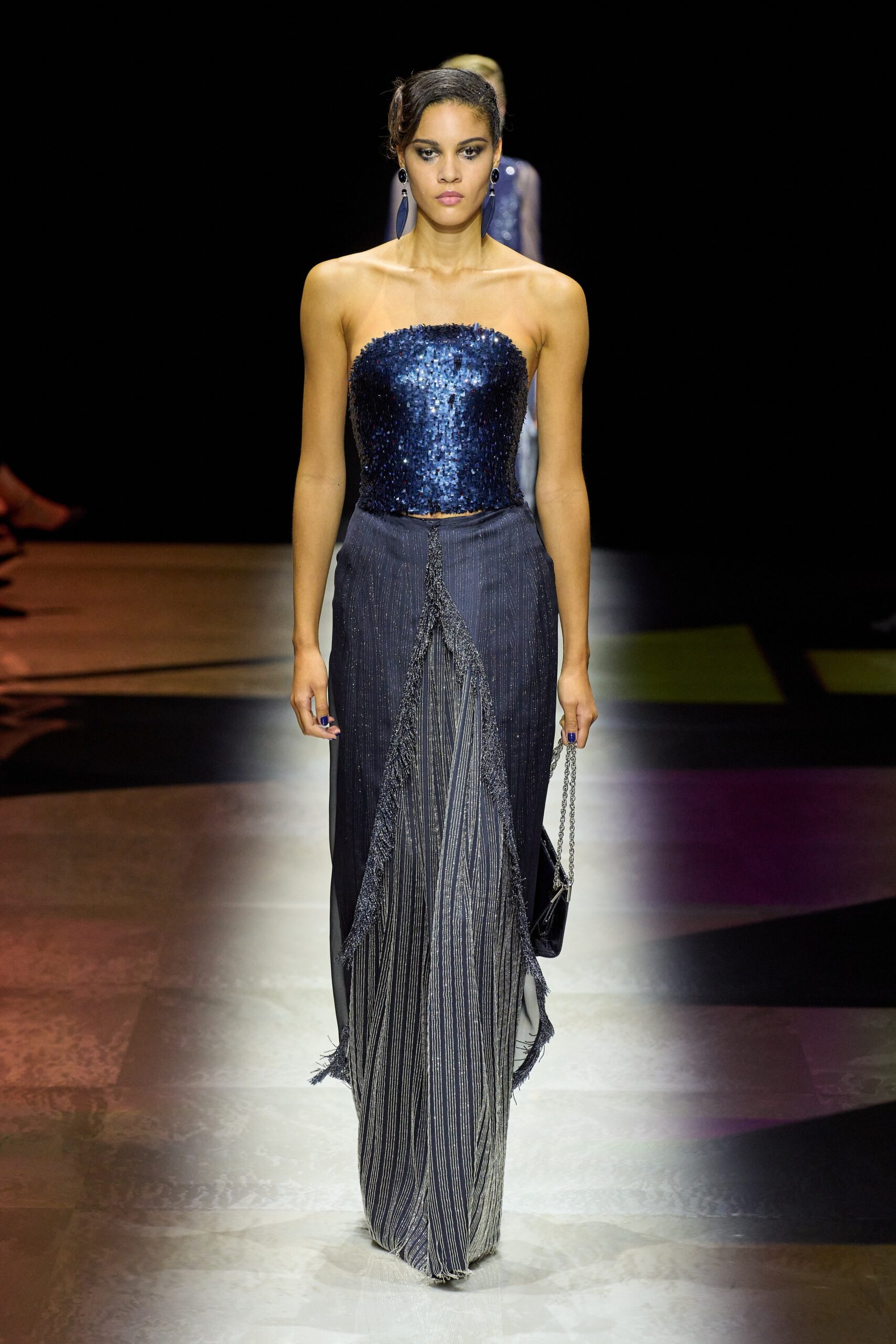 blue sequin strapless top and gray pleated skirt