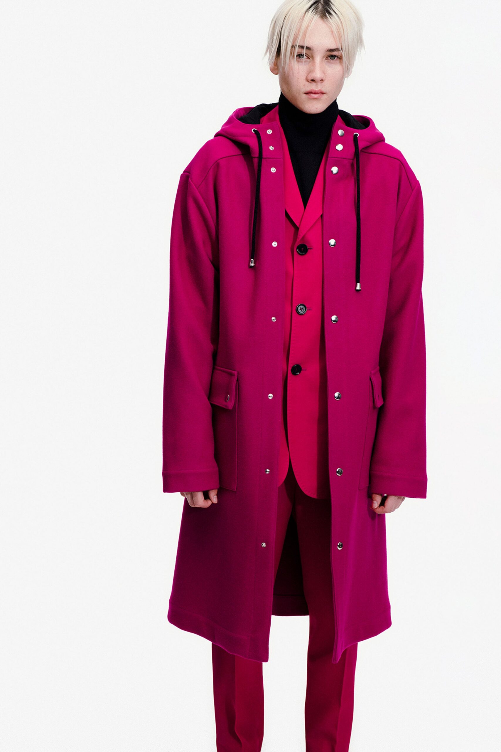 pink oversized coat and red tailored suit