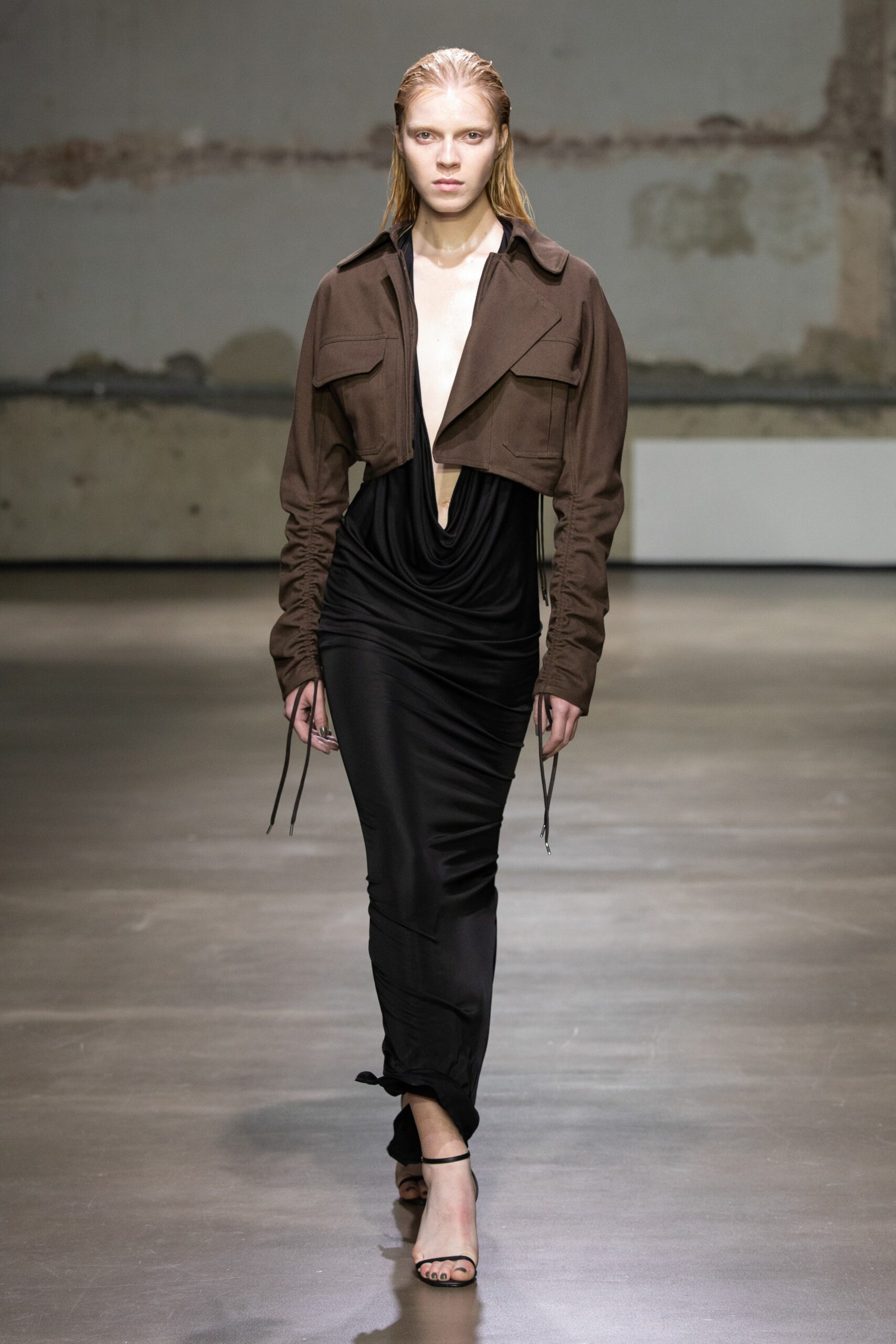 brown fitted jacket with black dress