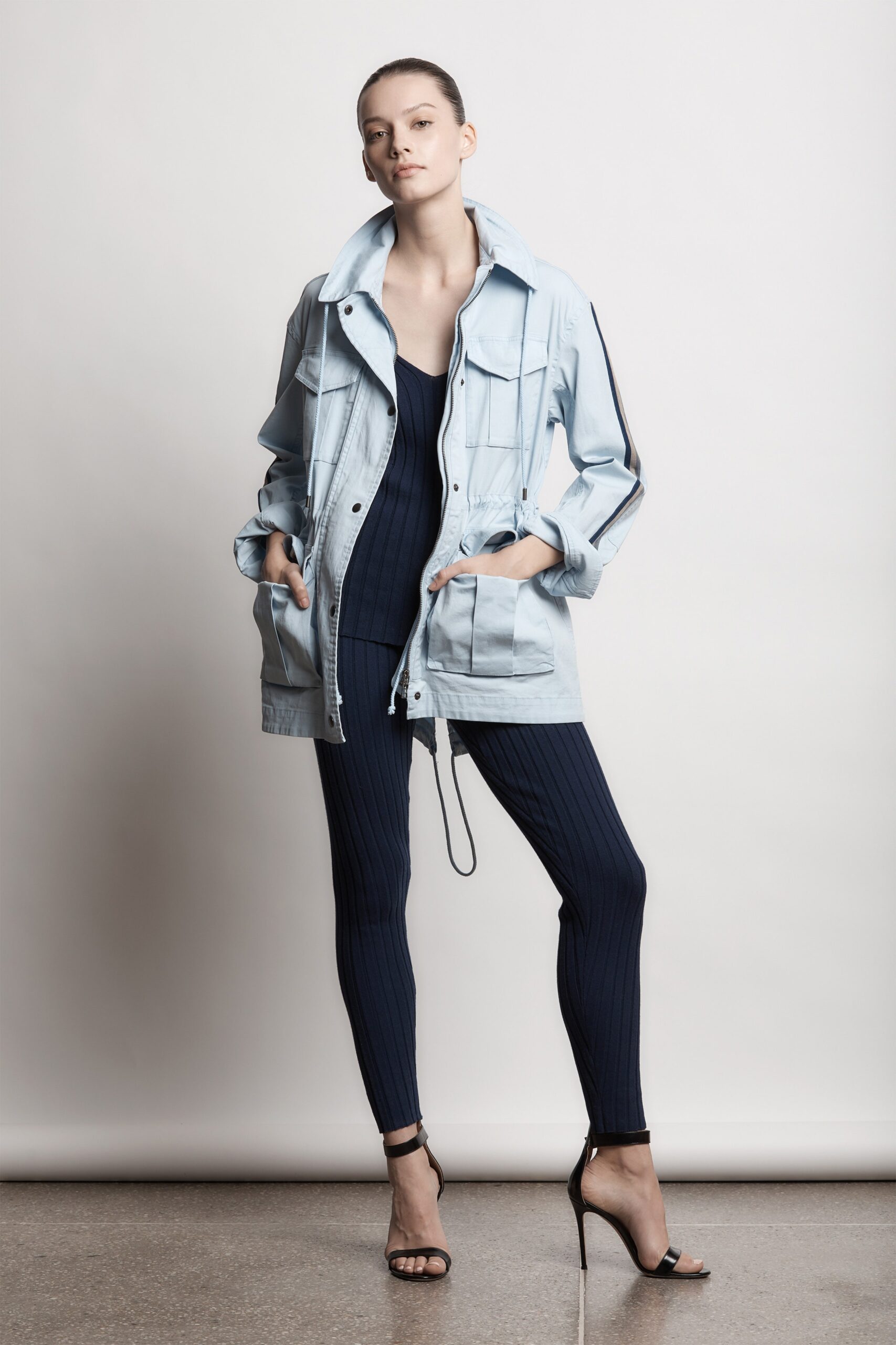 blue jacket with navy bodysuit and pants