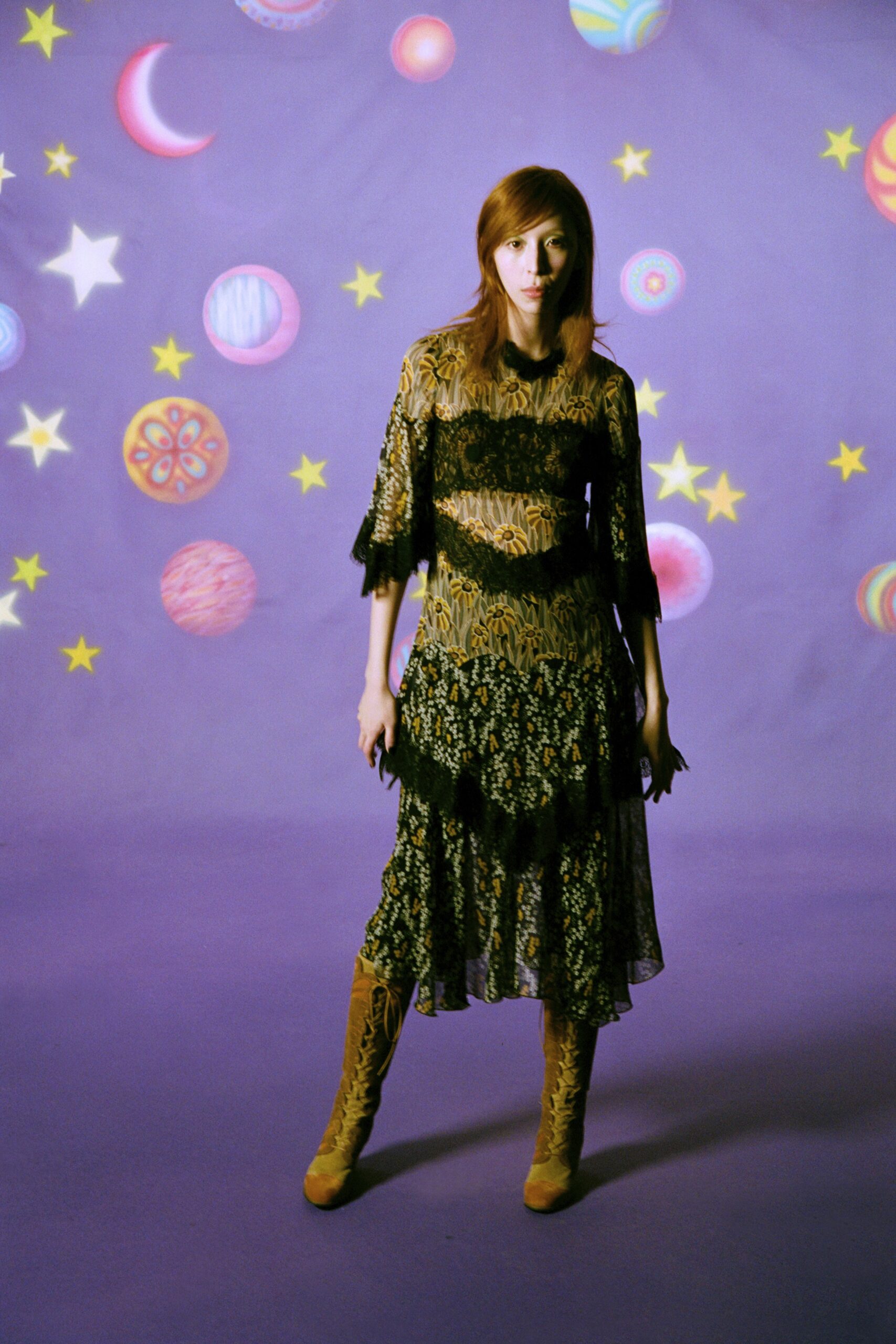 black lace midi dress with beige boots