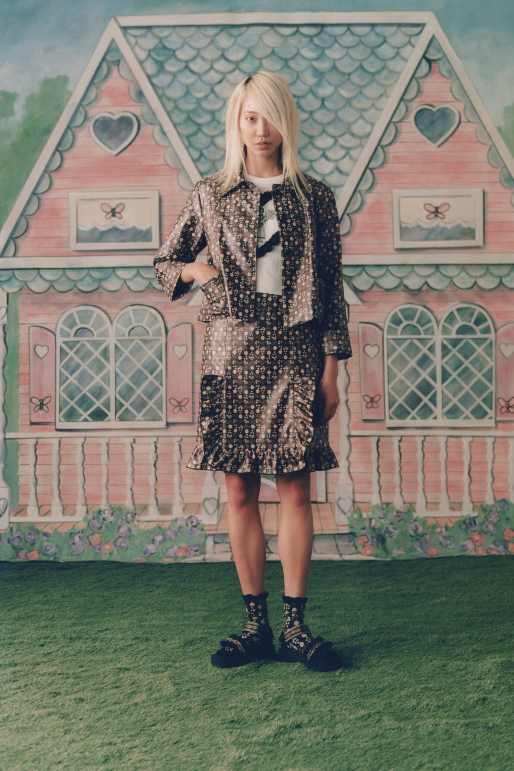 black and white fitted jacket with mini skirt