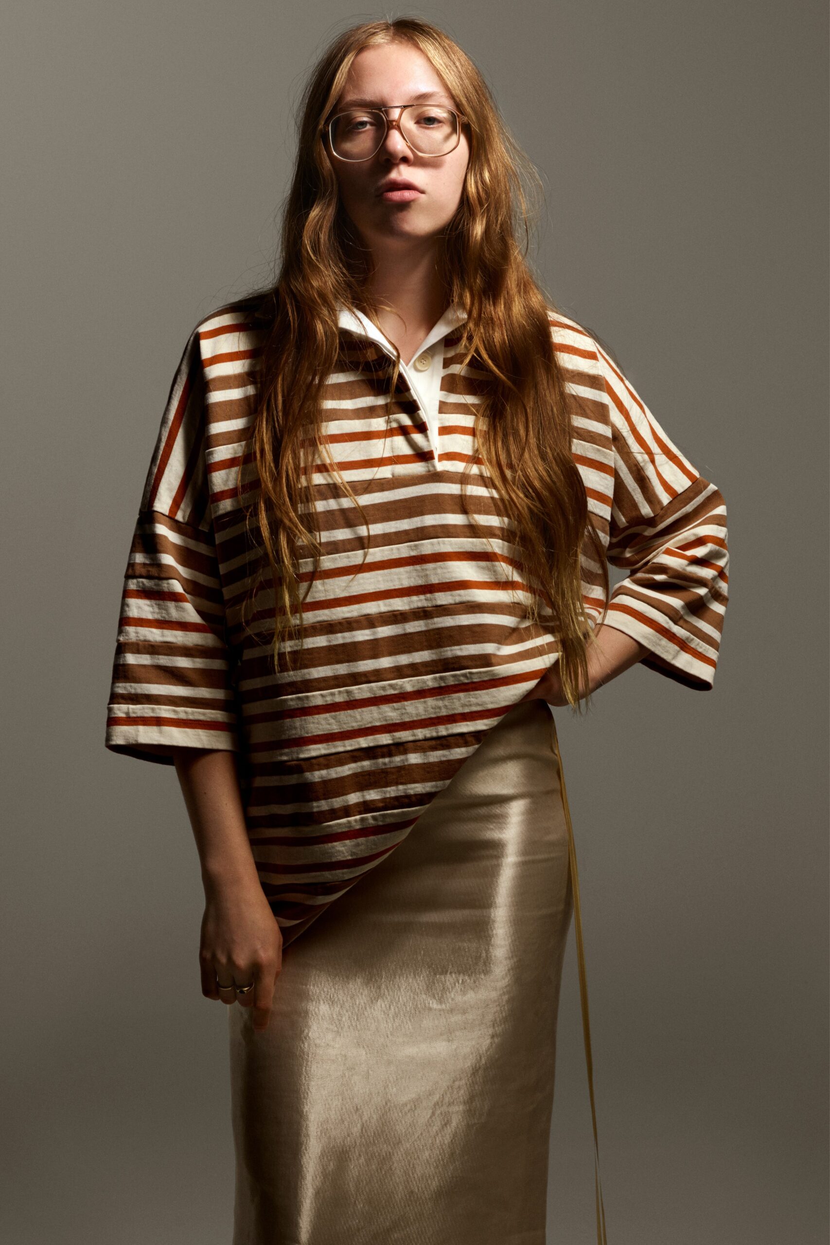 striped top and gold skirt