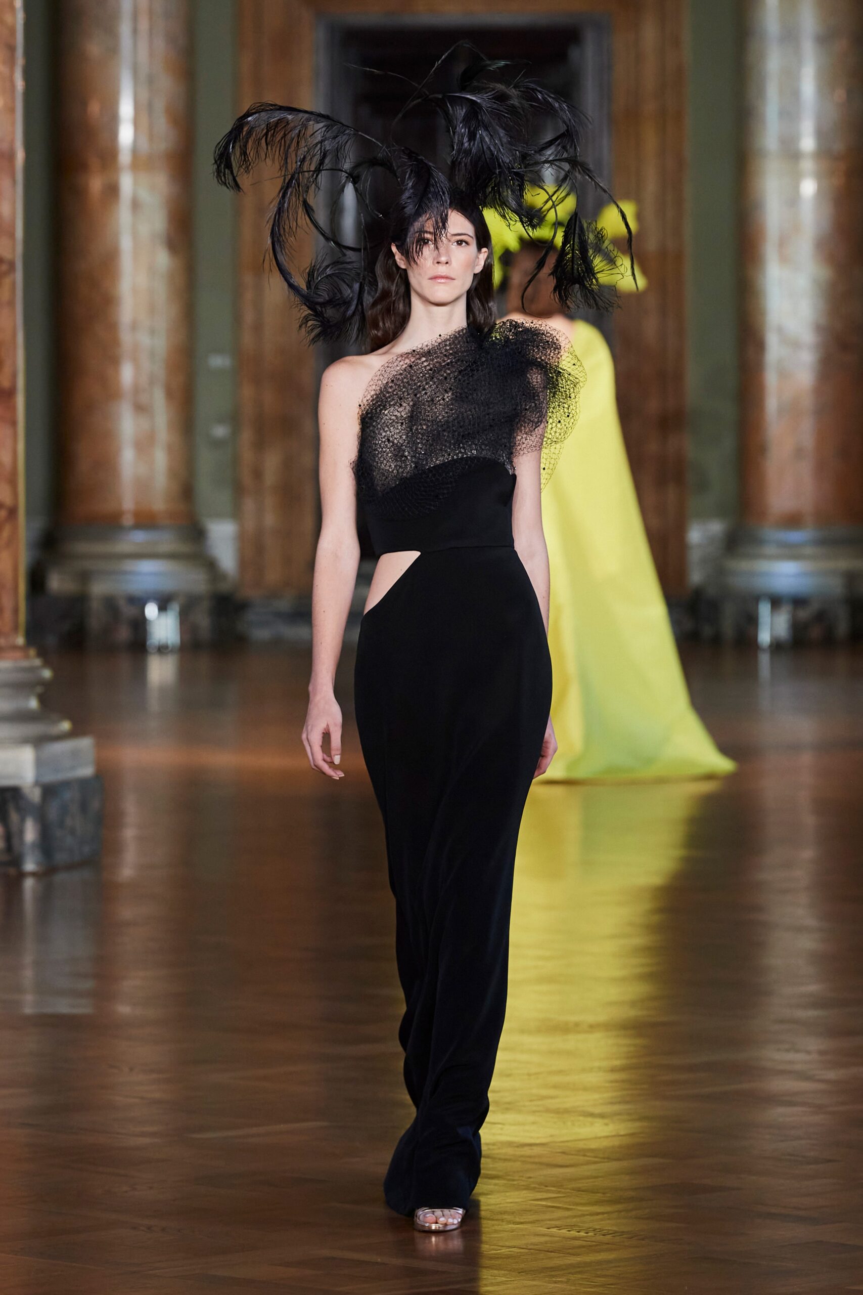 black velvet fitted gown with feather hat